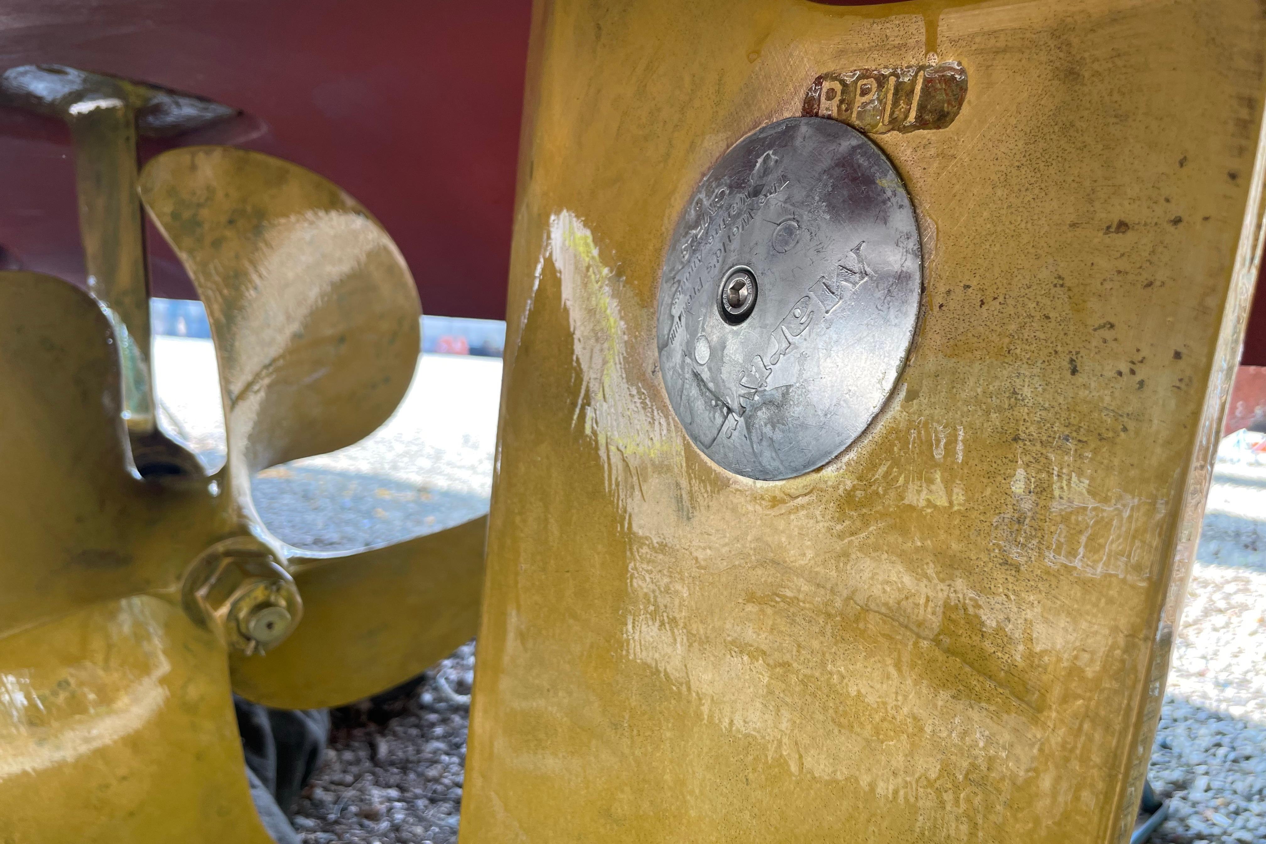 Close-up of a 2007 Back Cove 29 boat propeller and zinc anode.
