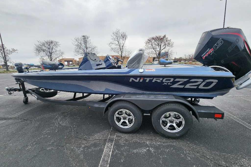 2026 Nitro Z20 XL boat on trailer in parking lot.