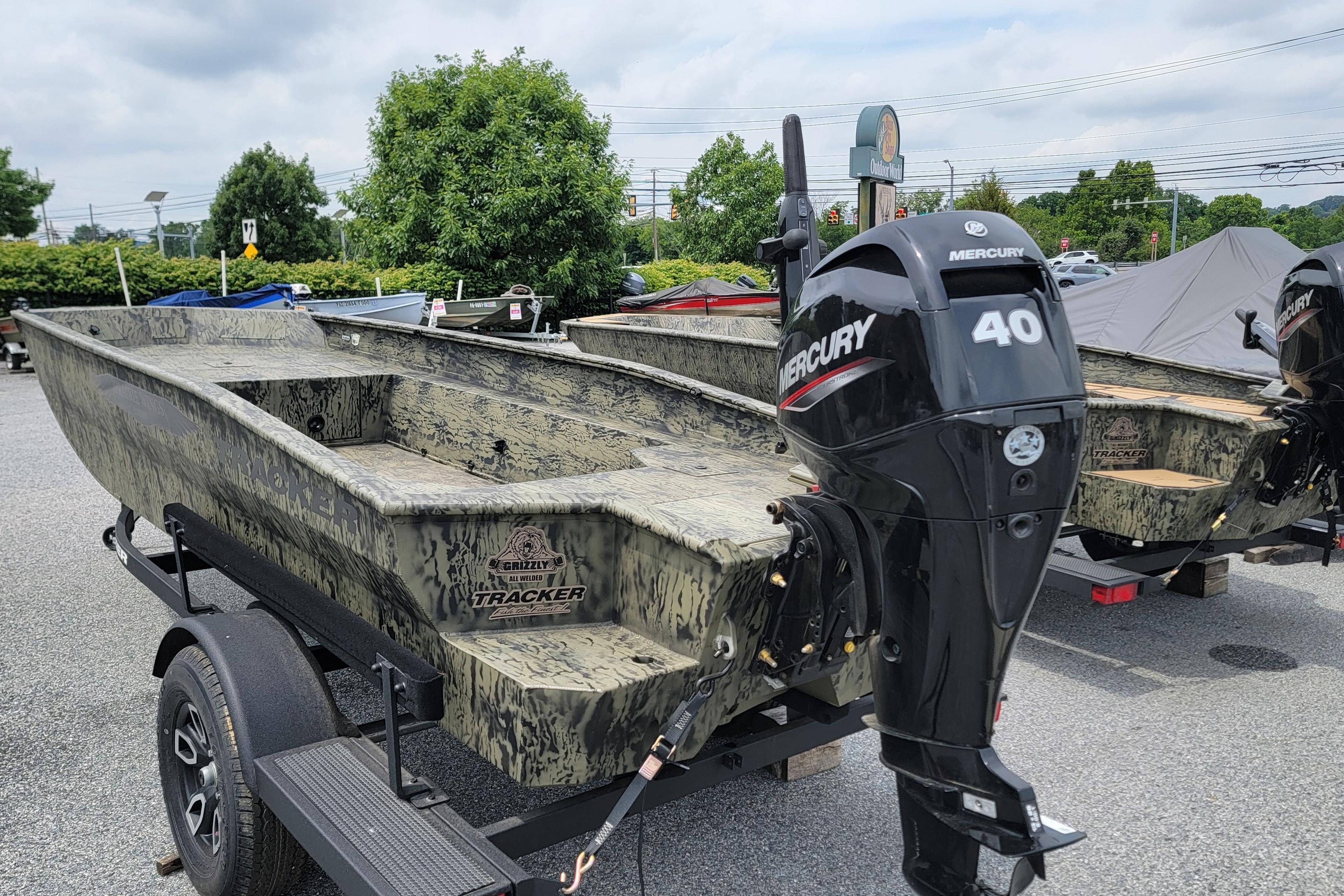 2026 Tracker Grizzly 1650 T Prairie Wings Edition boat with Mercury 40 outboard motor.