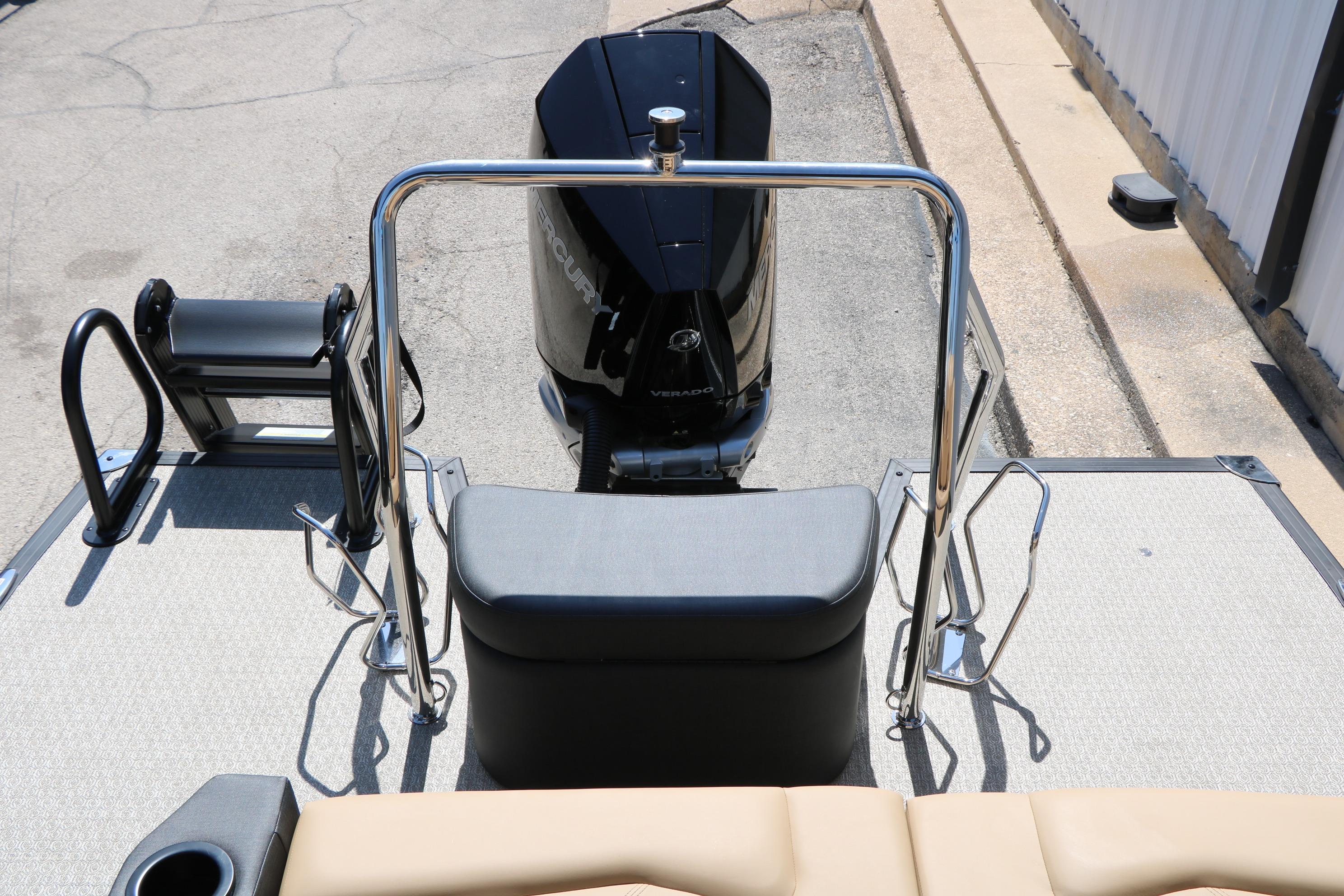 Rear view of 2026 Evotti 725 CS Tri-Toon boat with outboard motor and seating.