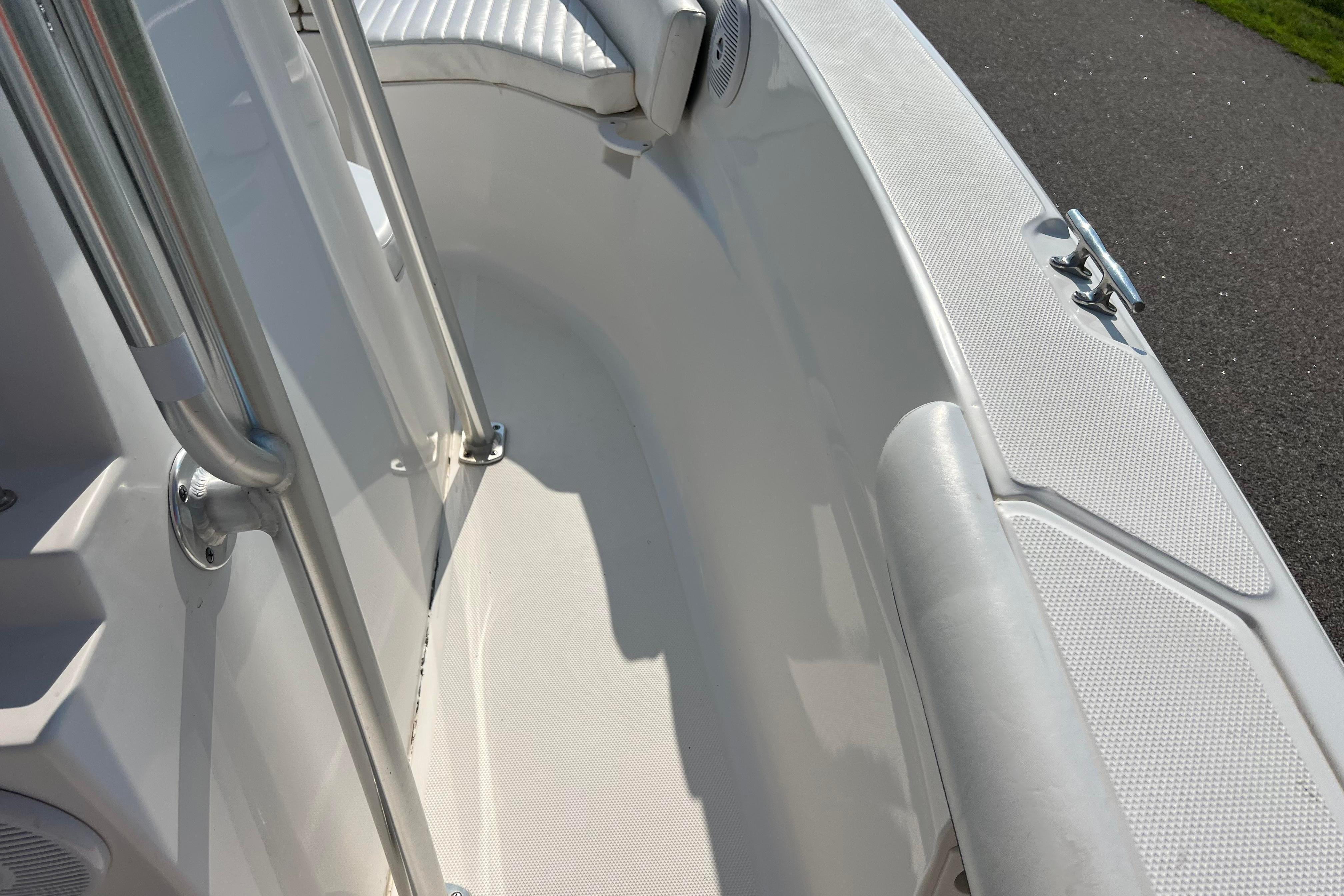 2012 Sea Fox 206 Center Console boat interior with seating and stainless steel railing.