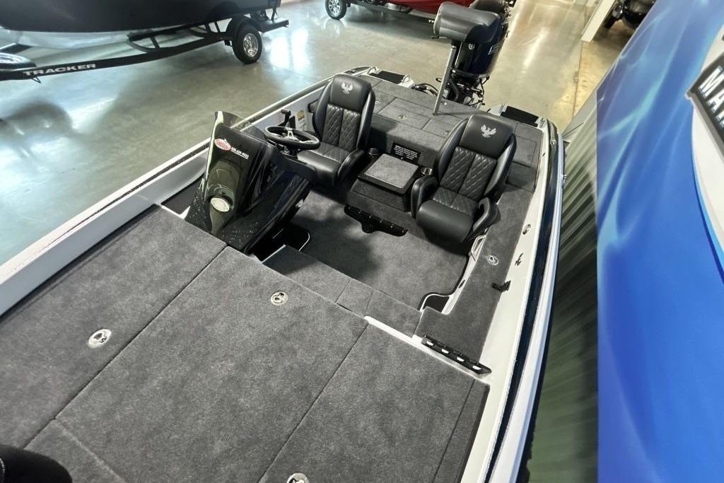 2026 Phoenix 818 Pro boat interior with dual seats and steering console.