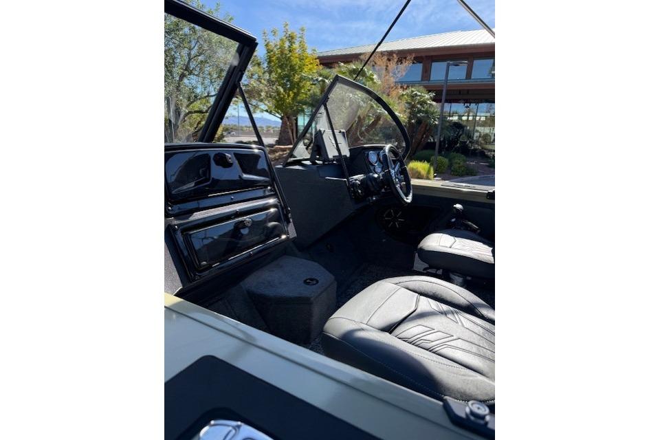 Interior view of 2026 Tracker Targa V-19 WT boat with leather seats and dashboard.