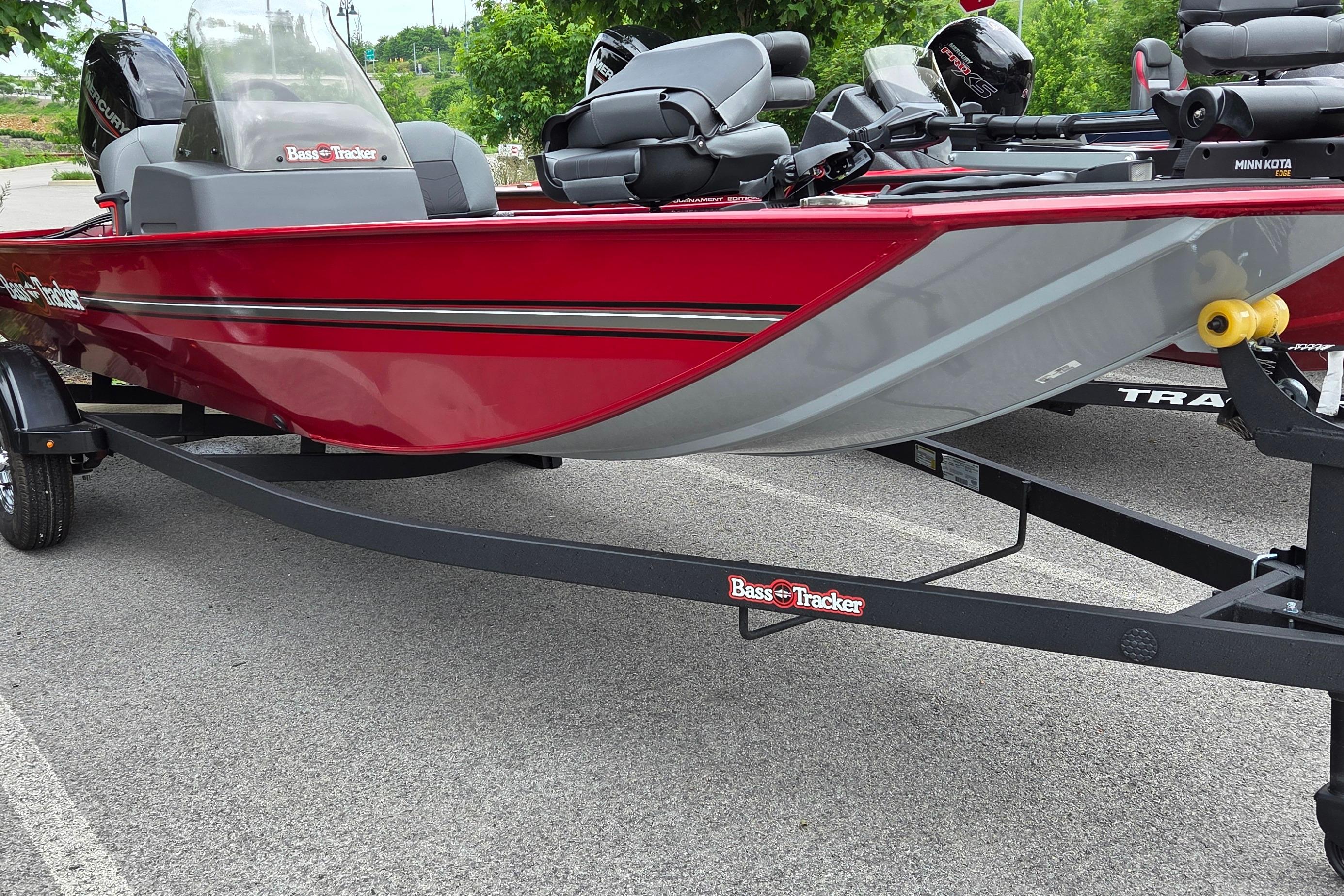 2026 Tracker Bass Tracker Classic XL boat on trailer, red and gray design.