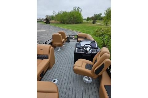 2026 Ranger 220FC boat with tan seating and sleek deck design.