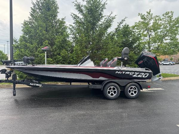 2025 Nitro Z20 XL Pro boat on trailer, parked outdoors.