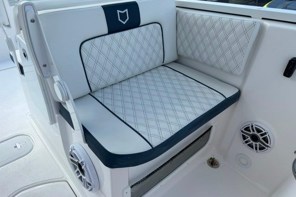 2026 Sea Fox 288 Traveler boat seat with diamond-pattern upholstery and integrated speaker.