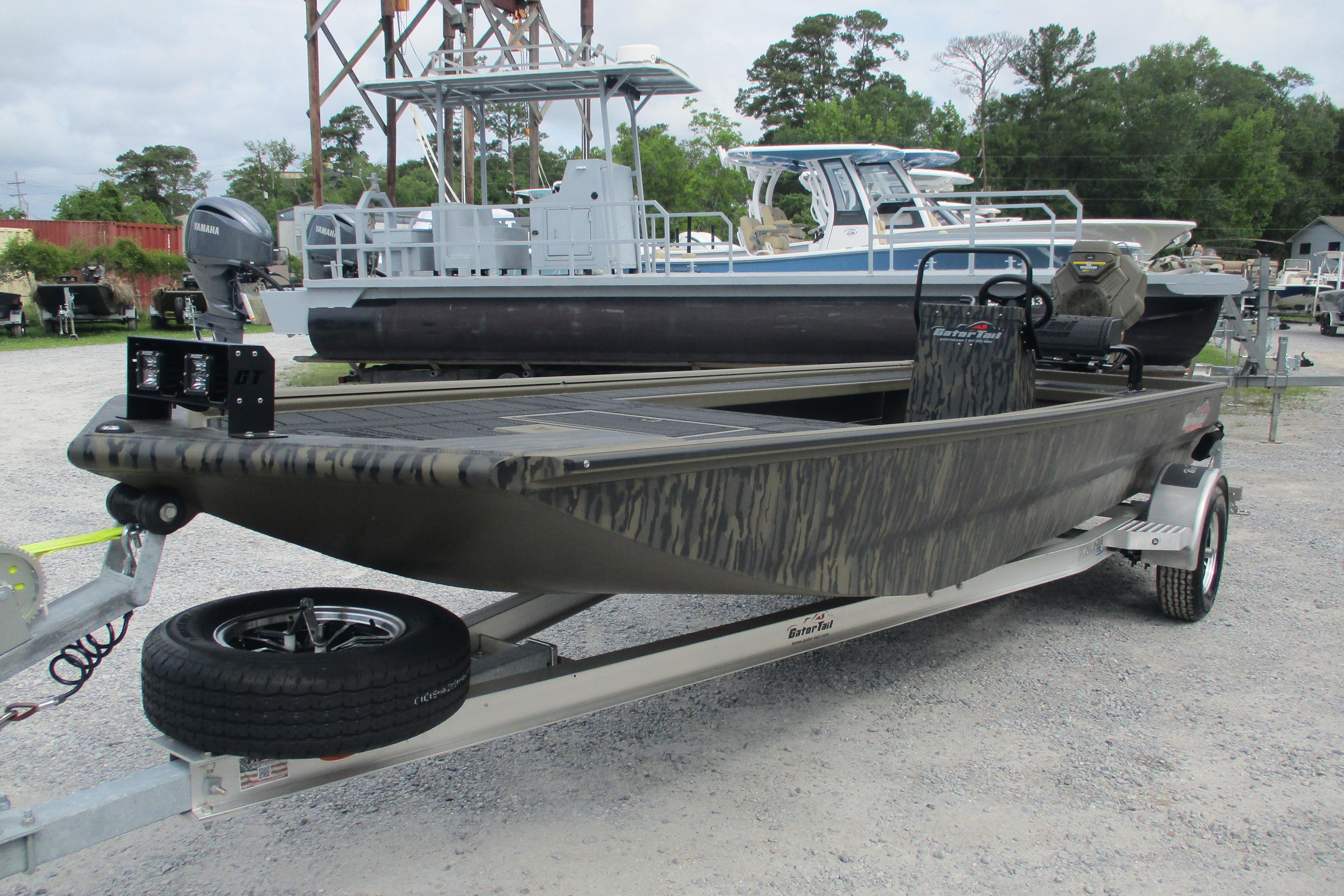 2026 Gator Tail 2060 Extreme CC boat on trailer, parked outdoors.