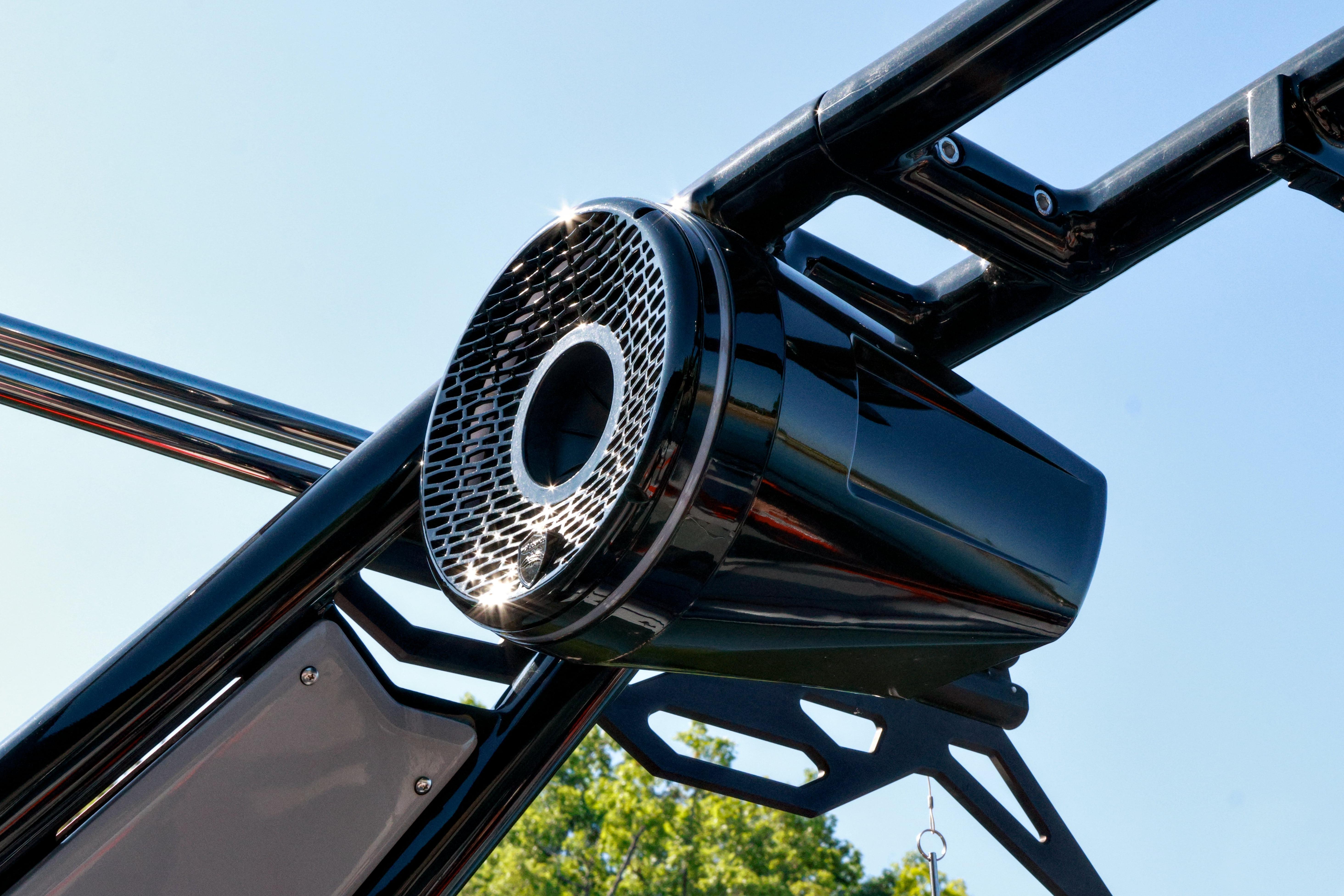 Close-up of a 2024 Centurion Fi23 boat speaker against a clear blue sky.