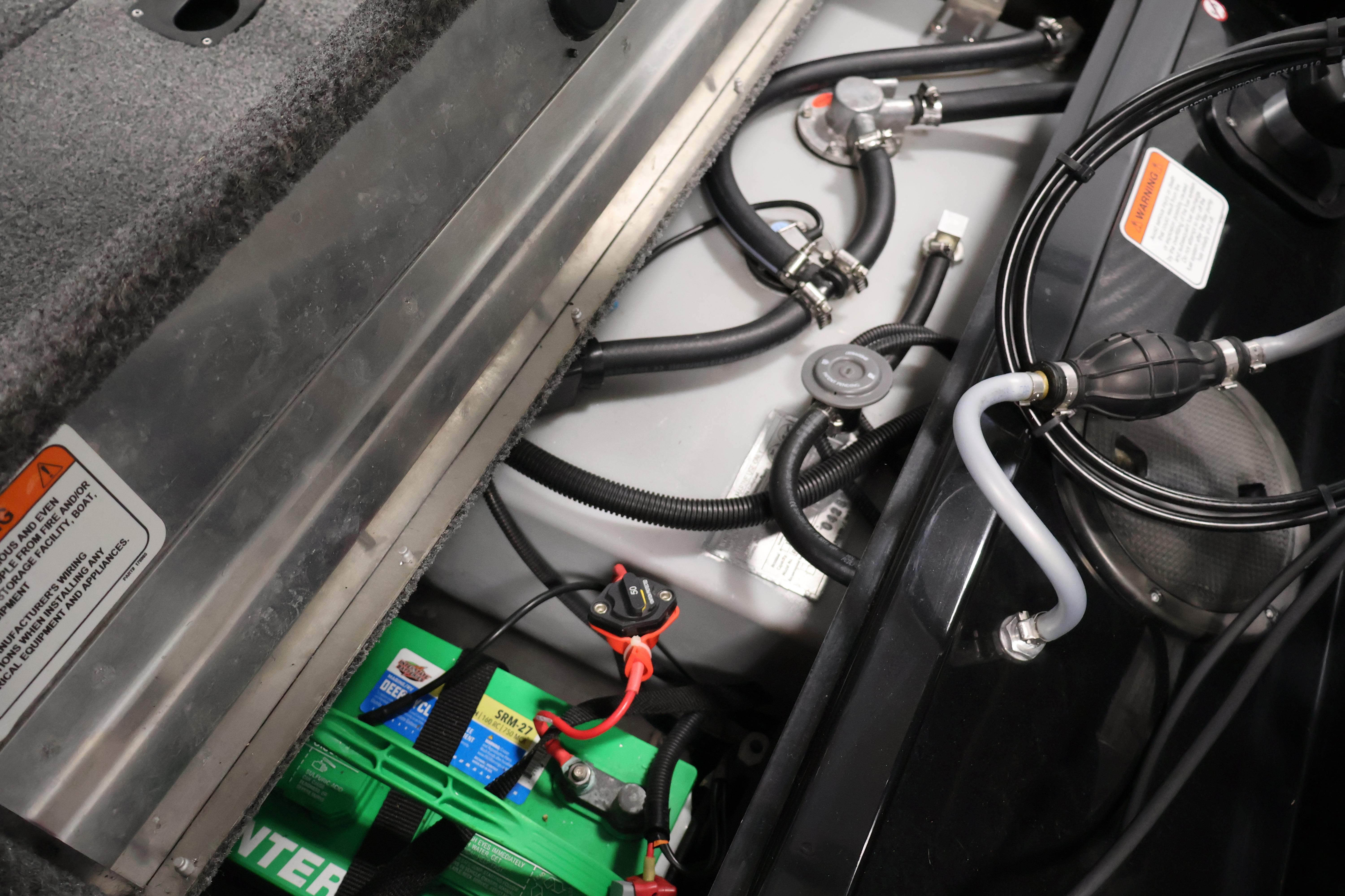 2024 Tracker Pro 170 boat interior showing battery and fuel system components.
