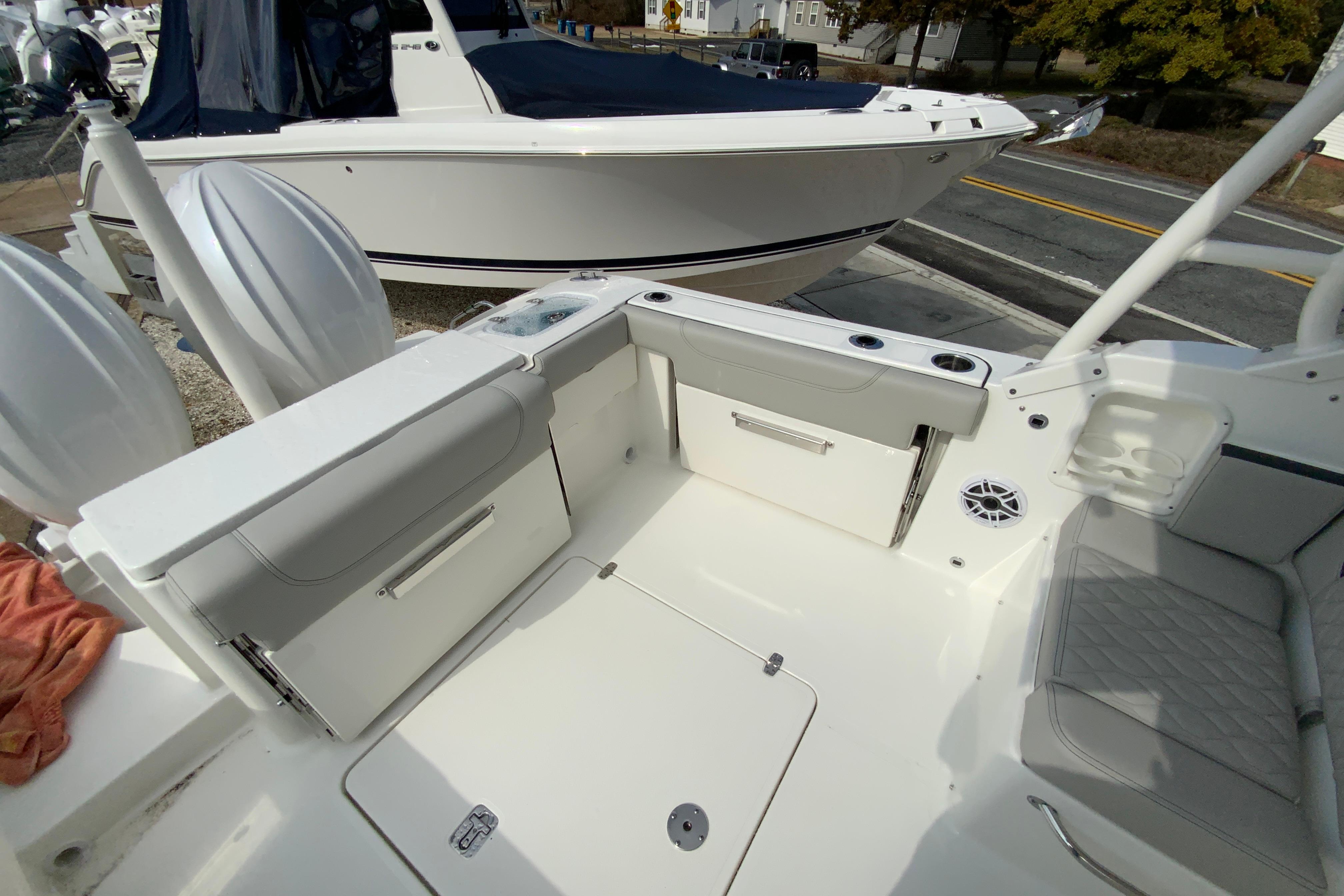2026 Pursuit DC 266 Dual Console boat interior with seating and storage compartments.