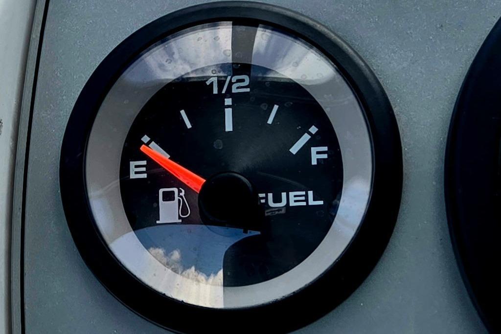 Fuel gauge showing empty on 2018 Tahoe 450 TS dashboard.