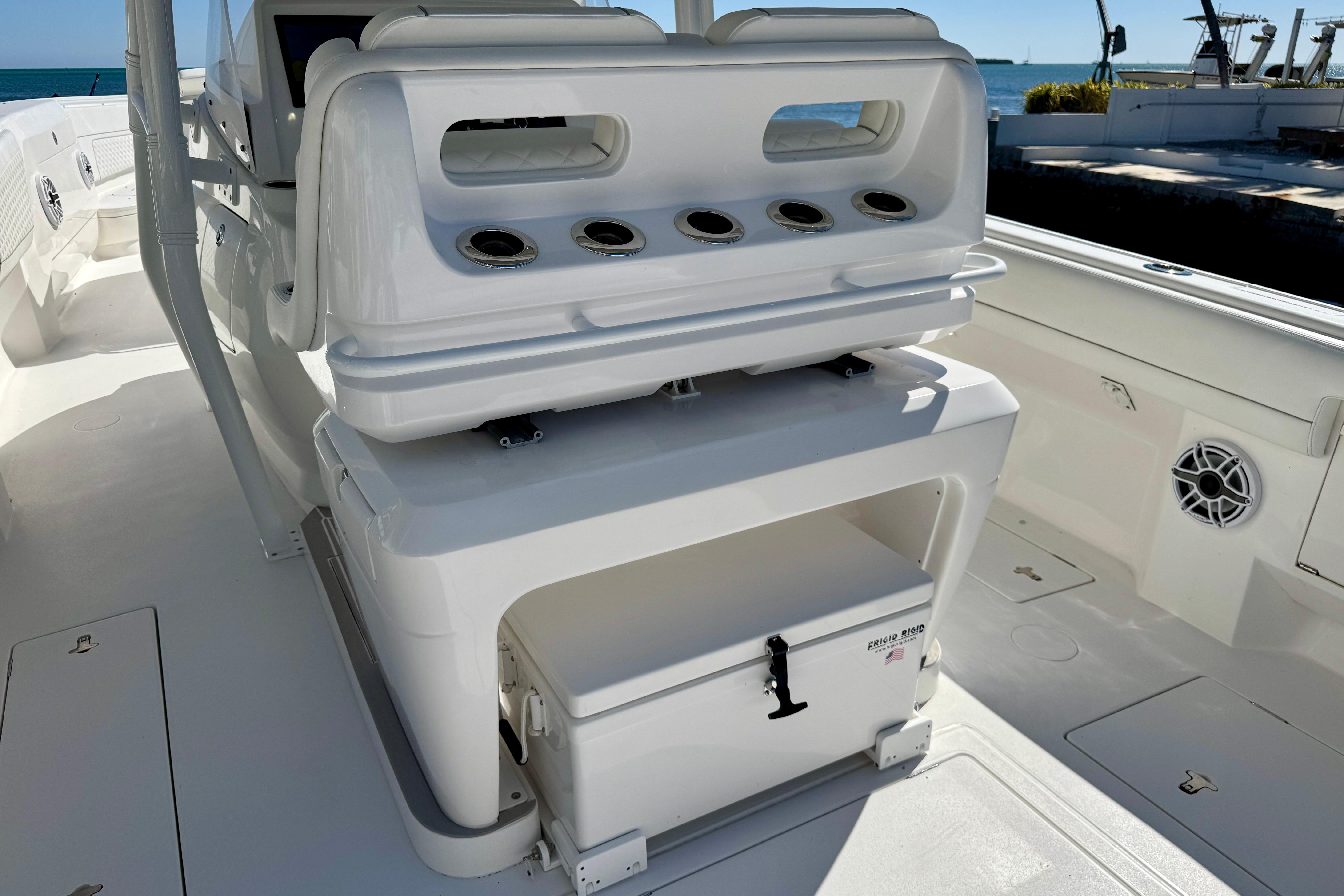 2024 Intrepid 407 Nomad FE boat interior with seating and storage compartments.