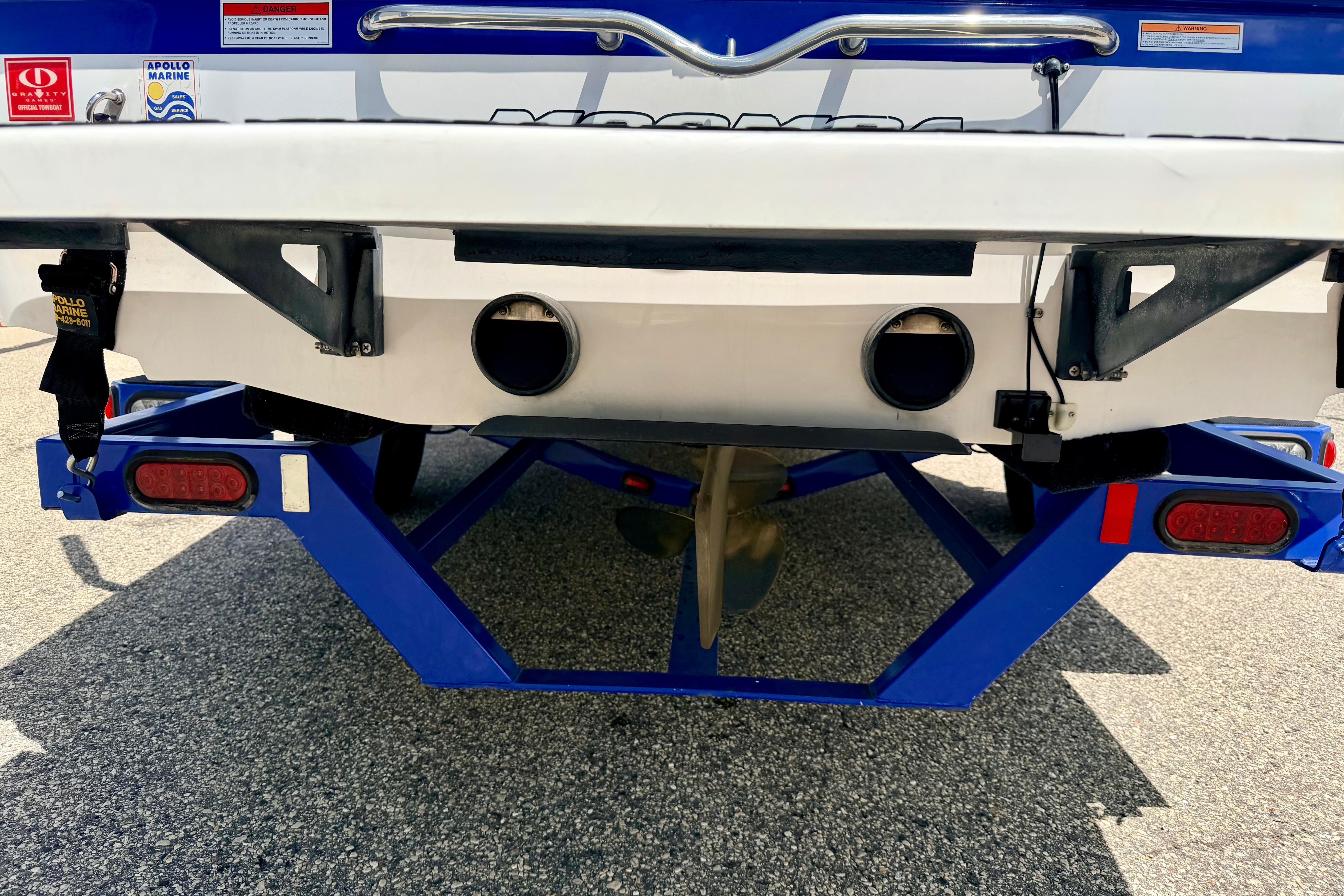 Rear view of a 2008 Moomba Outback V boat on a trailer.