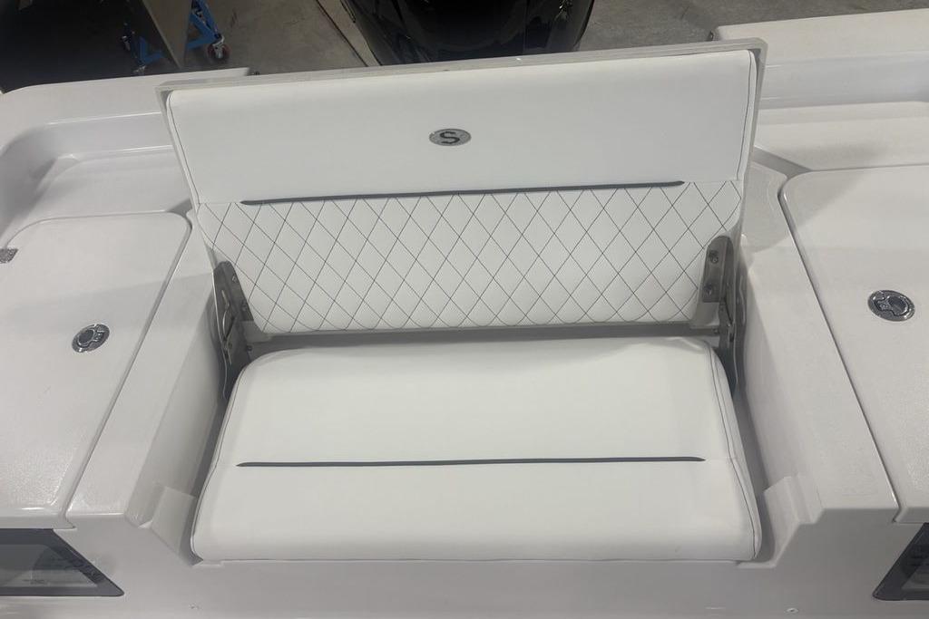 2026 Sportsman Masters 227 boat seat with white diamond-stitched upholstery.