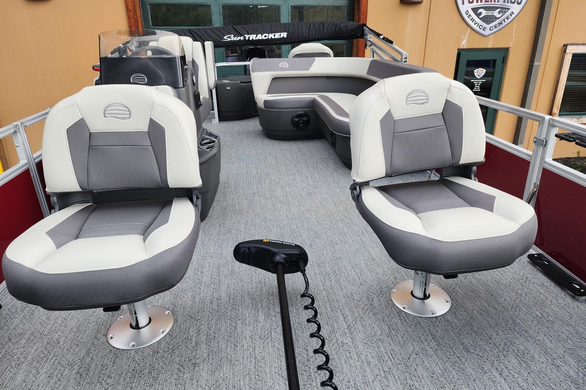2026 Sun Tracker Bass Buggy 18 DLX pontoon boat interior with plush seating and modern design.