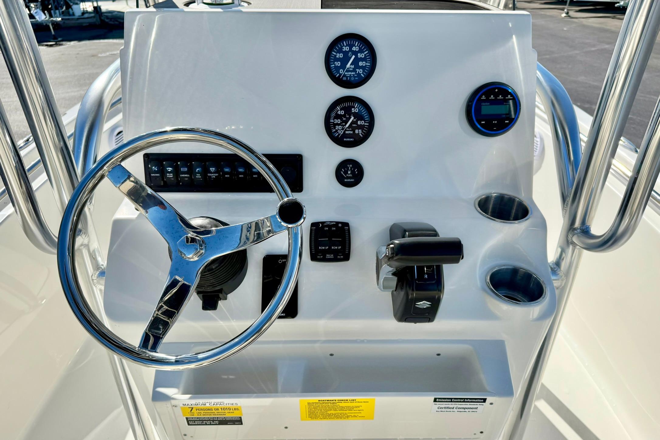 Steering console of 2026 Key West 189 FS boat with gauges and controls.