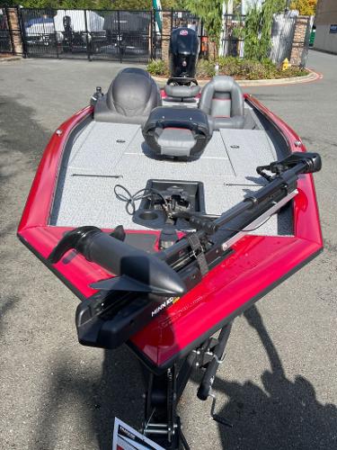 2023 Tracker Pro Team 190 TX boat, red exterior, equipped with Minn Kota trolling motor.