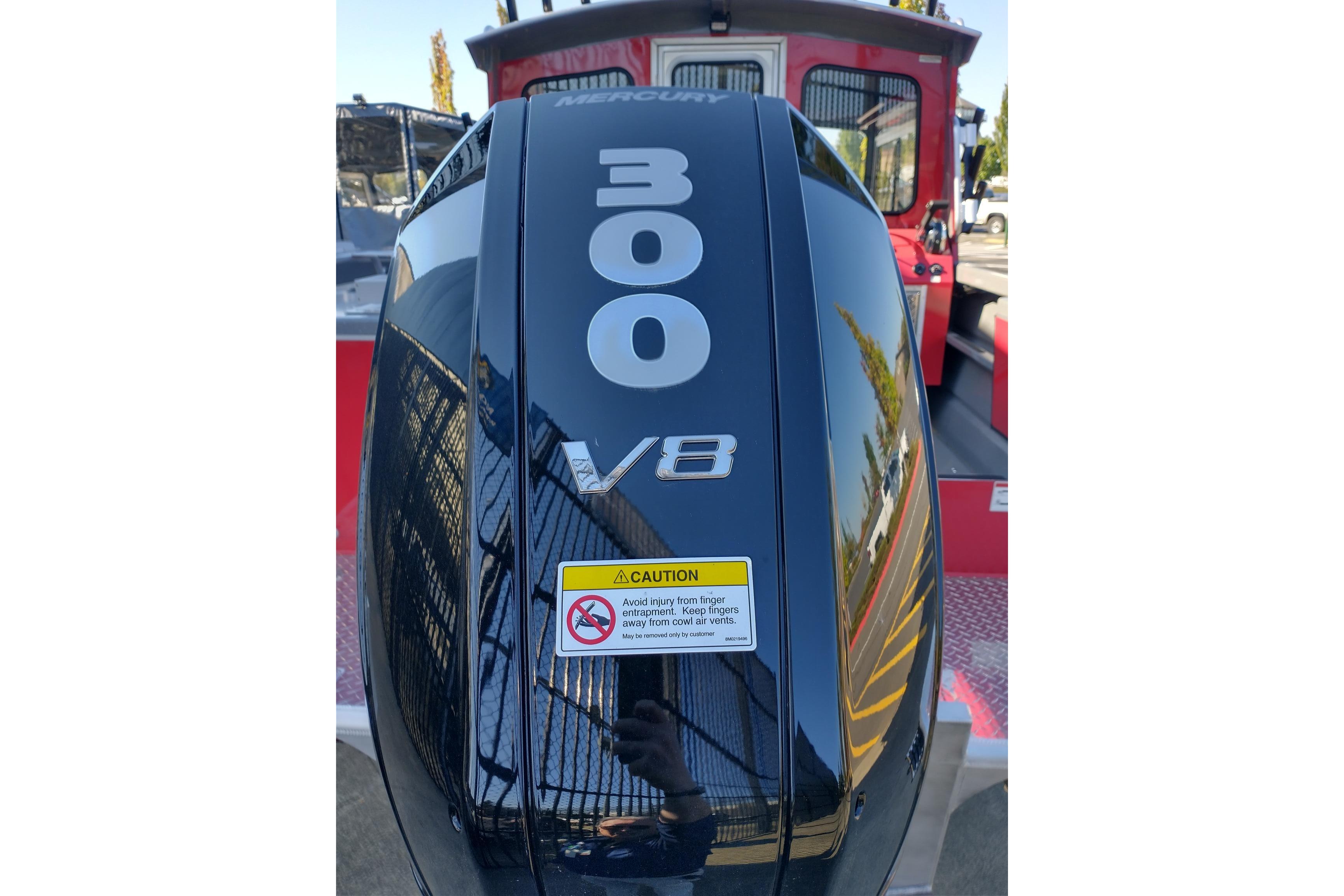 Outboard motor with "300 V8" label on a 2024 Spartan 220 Maximus Pro boat.