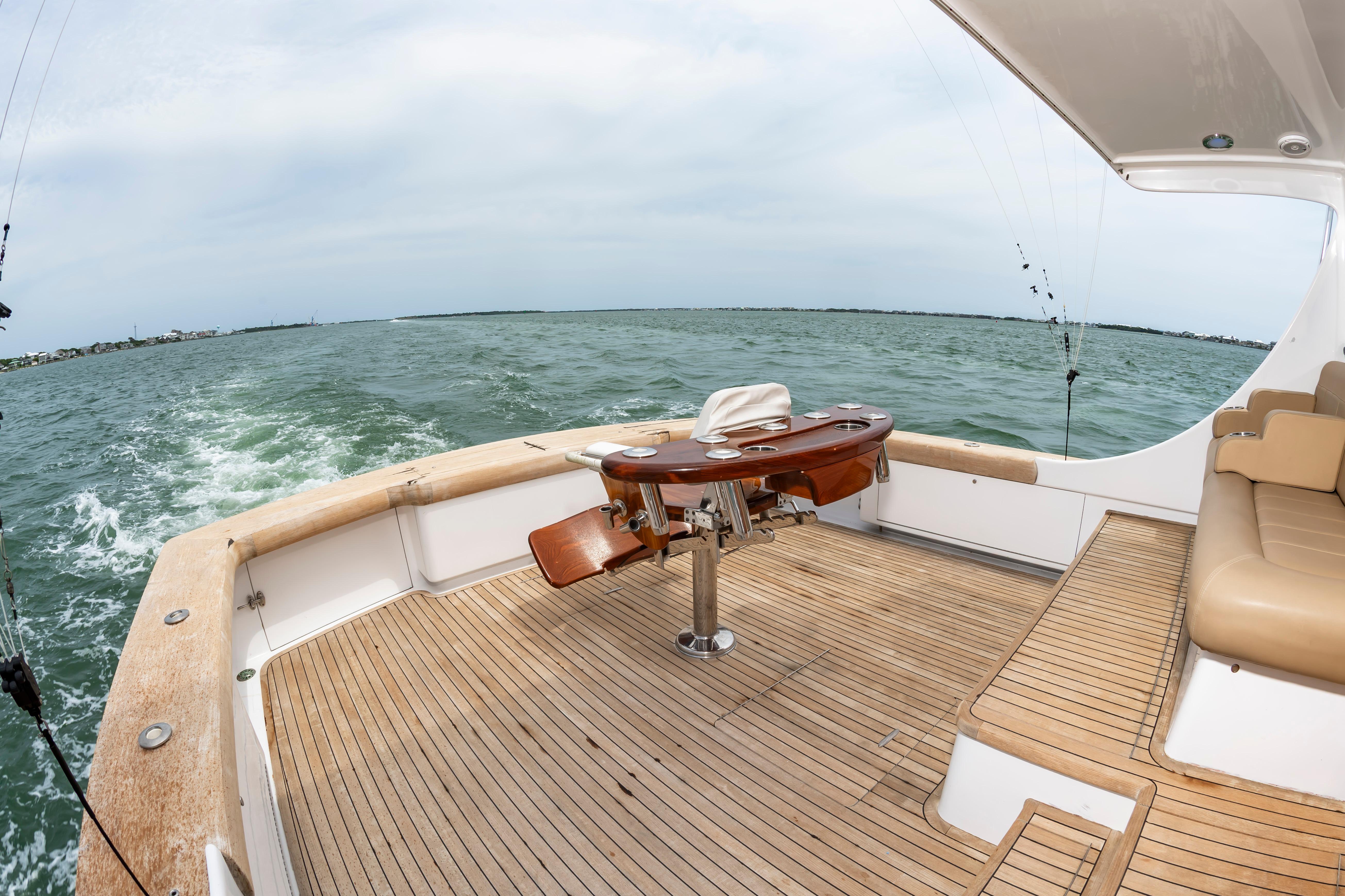 Custom Carolina Scarborough 56 Convertible yacht deck, 1993 model, cruising on open water.