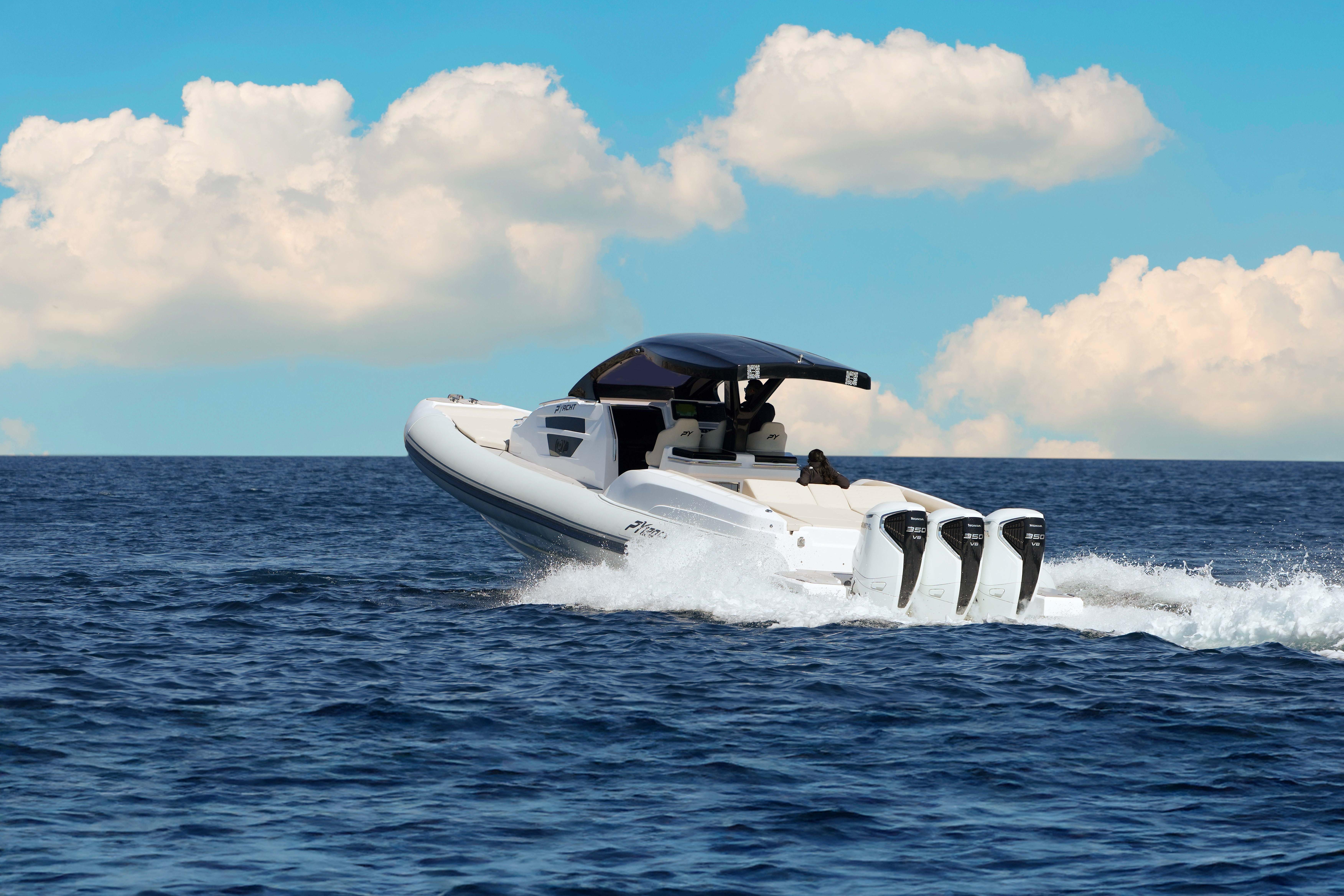 2026 PYACHT PY 120 GTS cruising on open sea under blue sky.