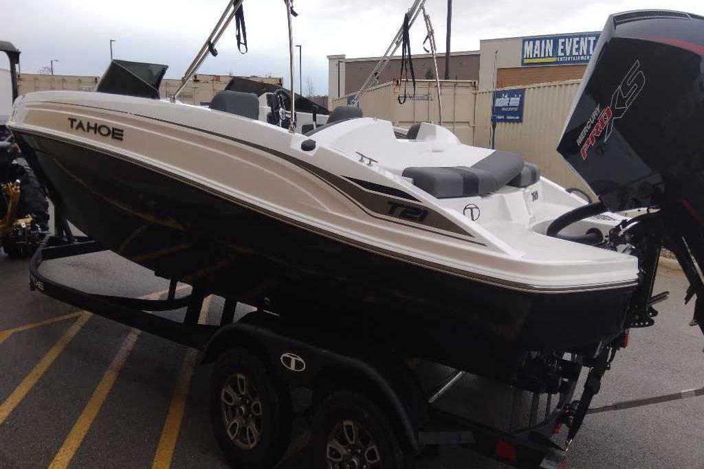 2026 Tahoe T21 boat on trailer, featuring sleek design and powerful engine.