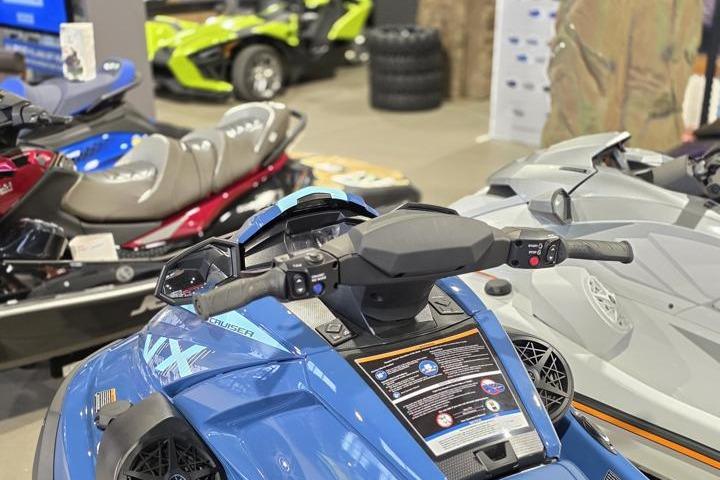 2026 Yamaha WaveRunner VX Cruiser in showroom, featuring sleek design and advanced controls.