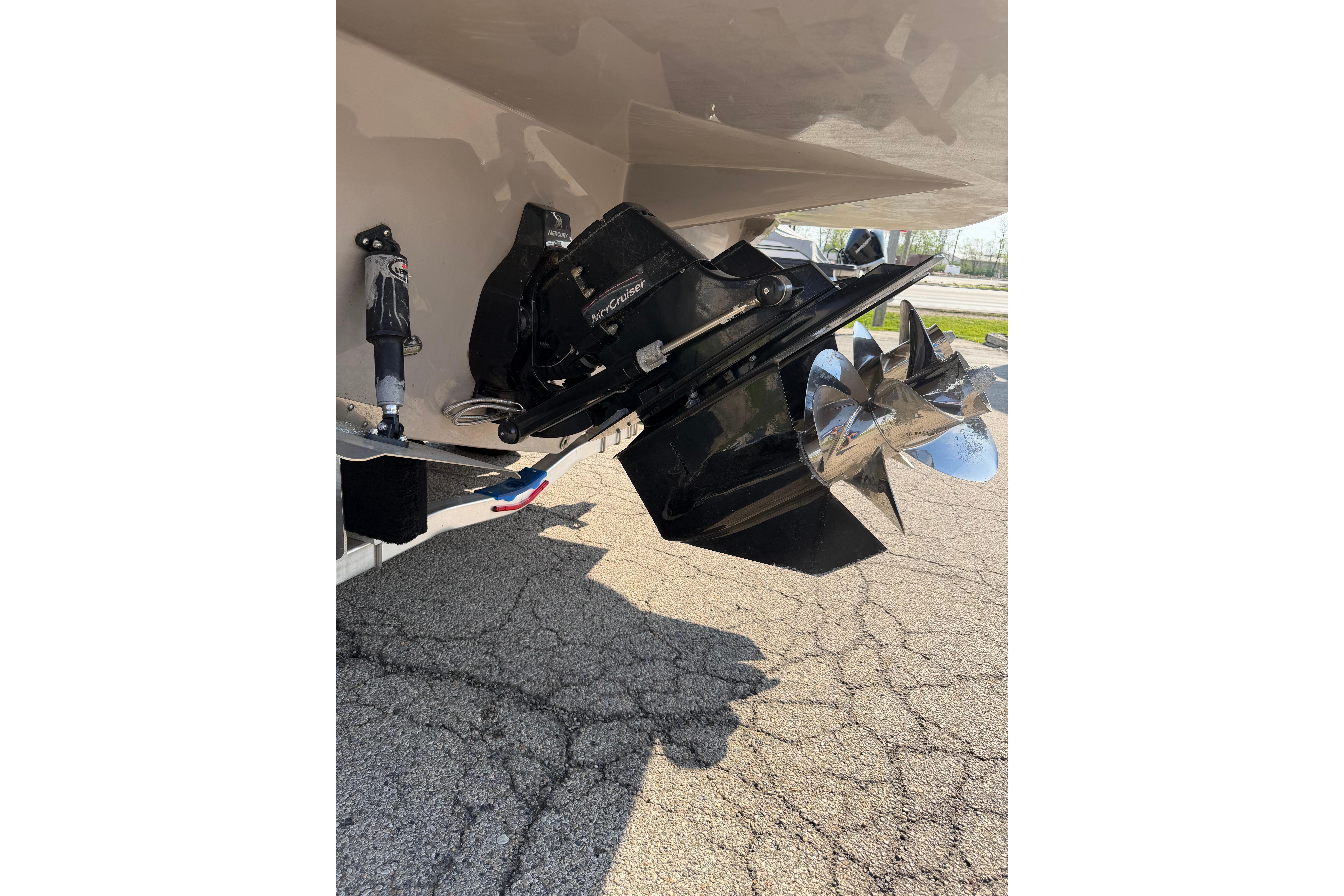 2019 Rinker EX 320 boat with MerCruiser outdrive and dual propellers.