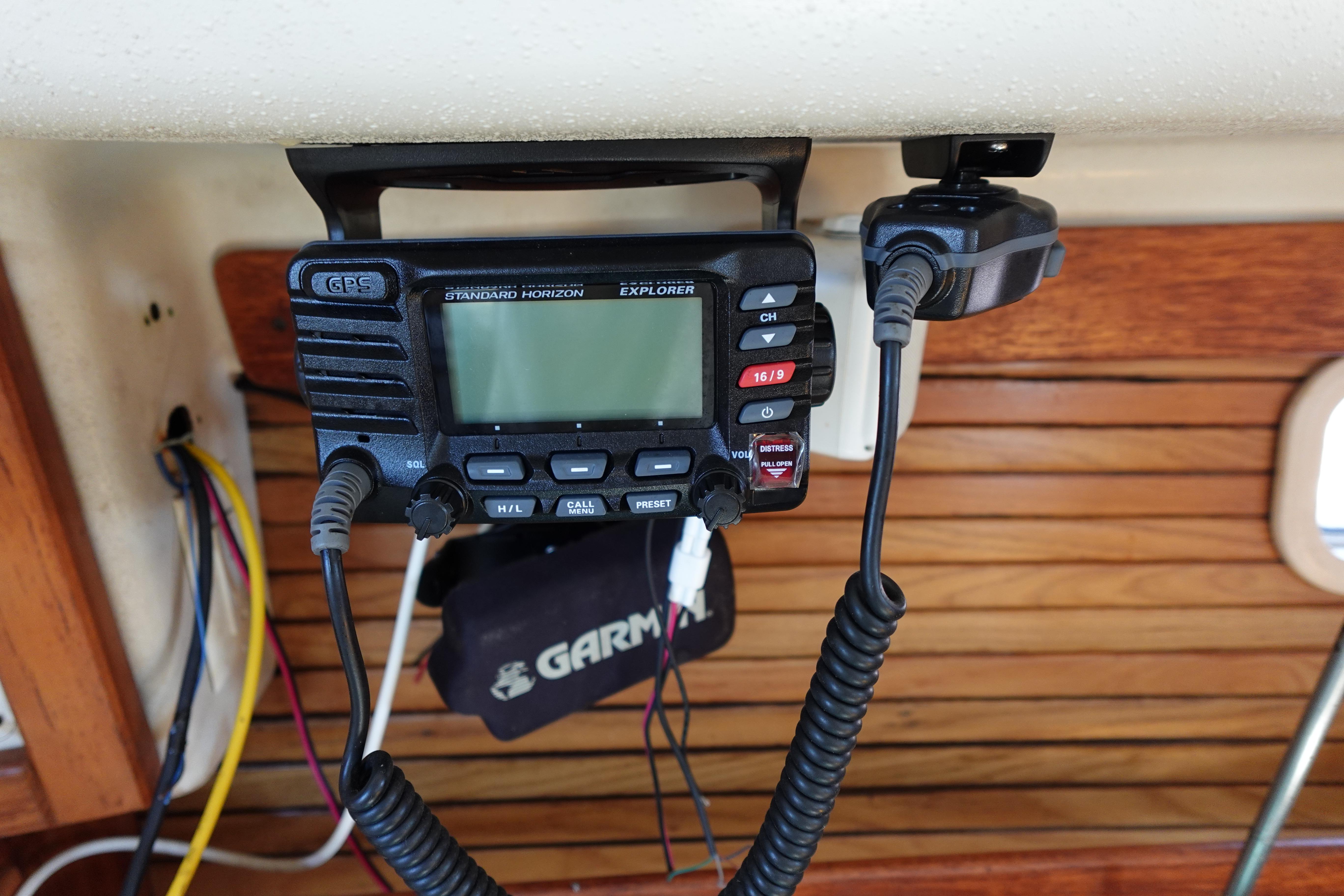 VHF radio on 1997 Catalina 28 sailboat, featuring Standard Horizon Explorer model.