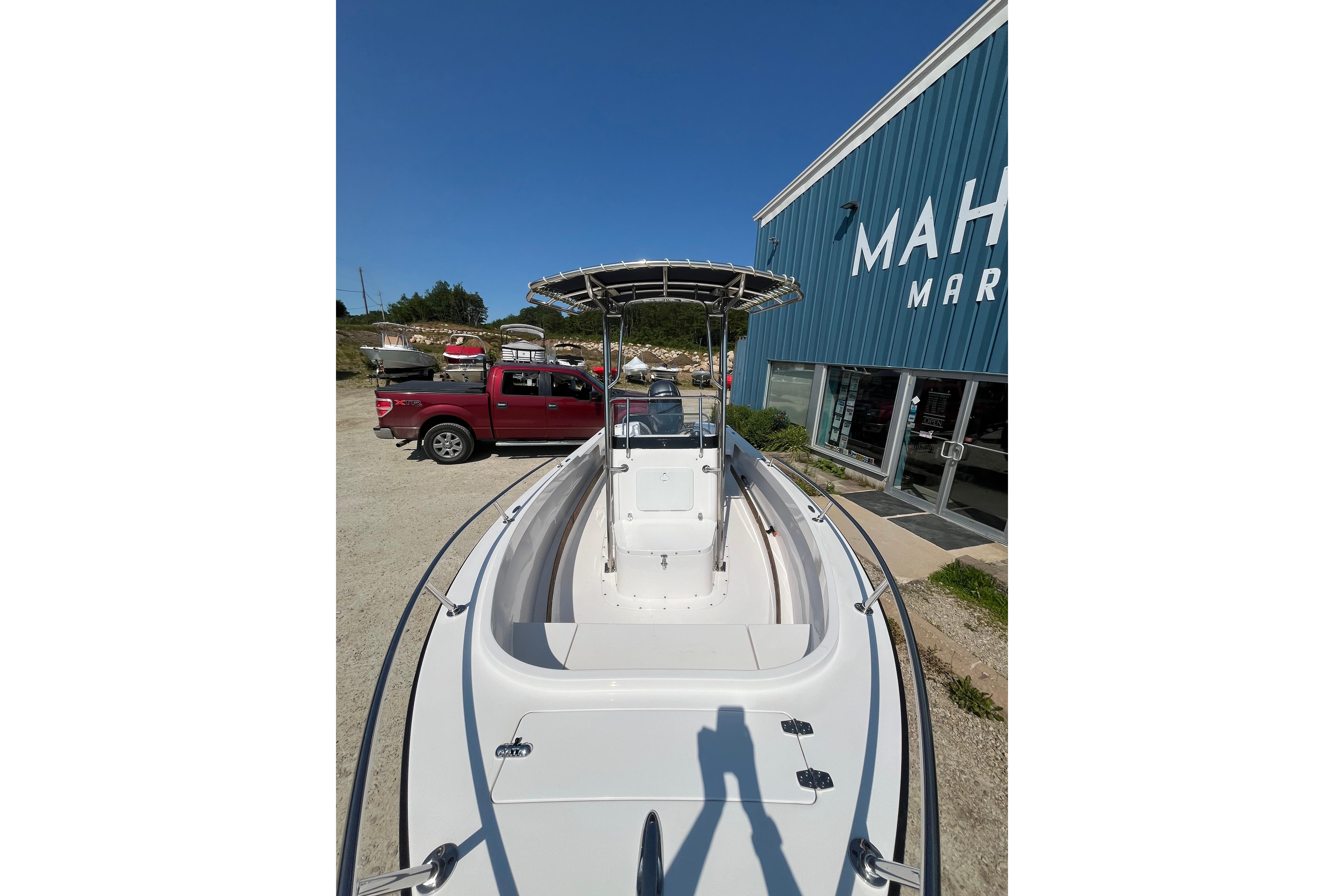 2021 Rossiter 17 CC boat displayed outside a marine store.