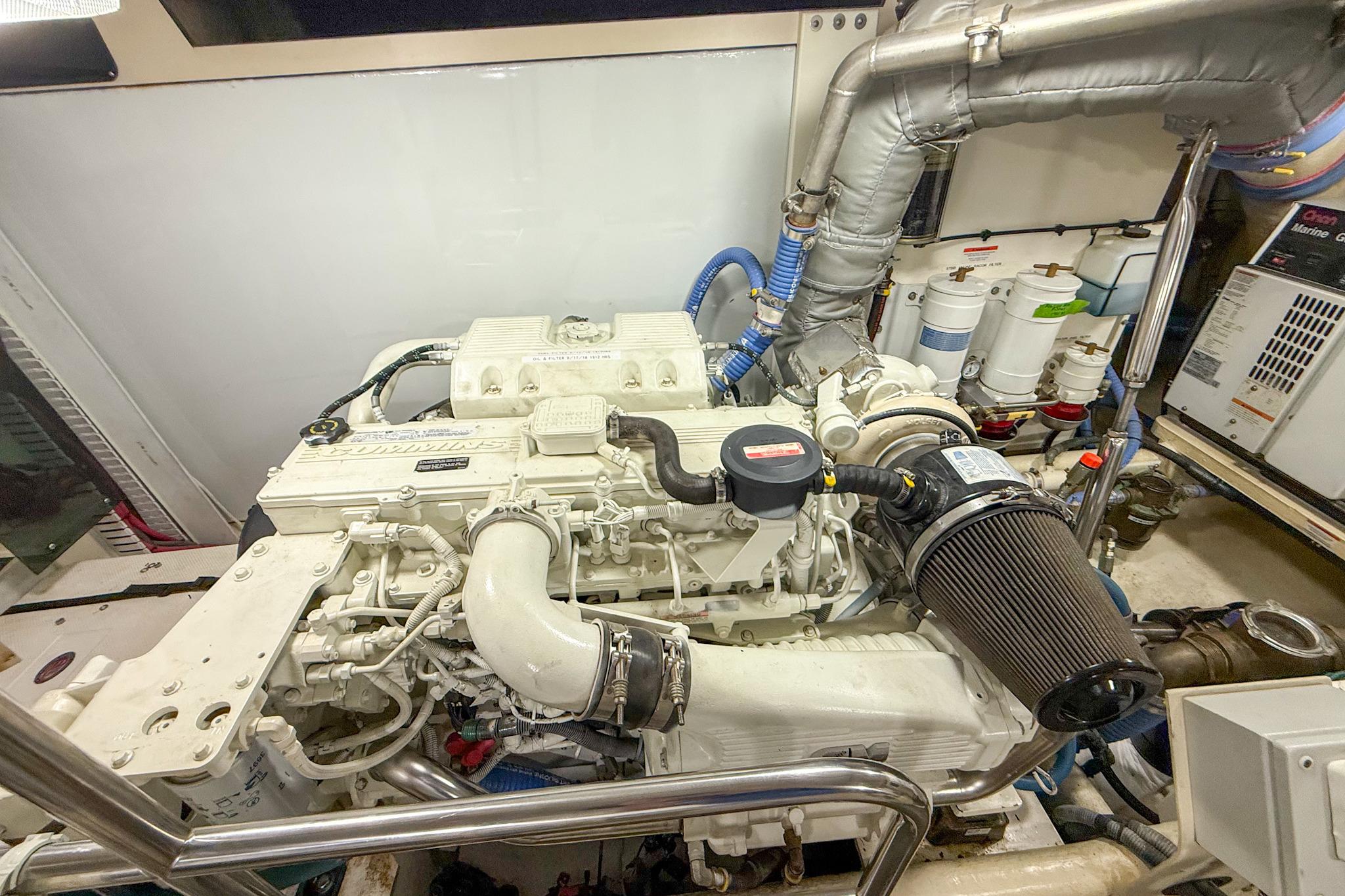 Engine room of a 2007 Nordic Tug 54, showcasing detailed machinery and components.