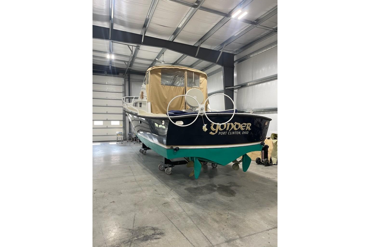 1964 Striker Model 120 boat named "Yonder" in indoor storage, Port Clinton, Ohio.