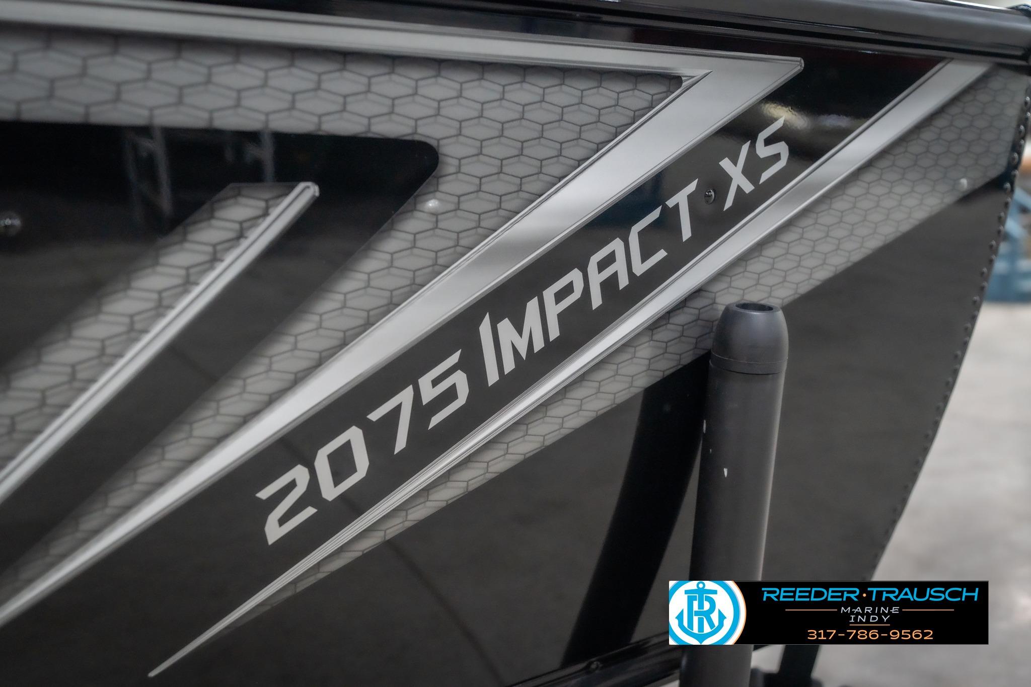 2026 Lund 2075 Impact XS boat with sleek design and hexagonal pattern detailing.