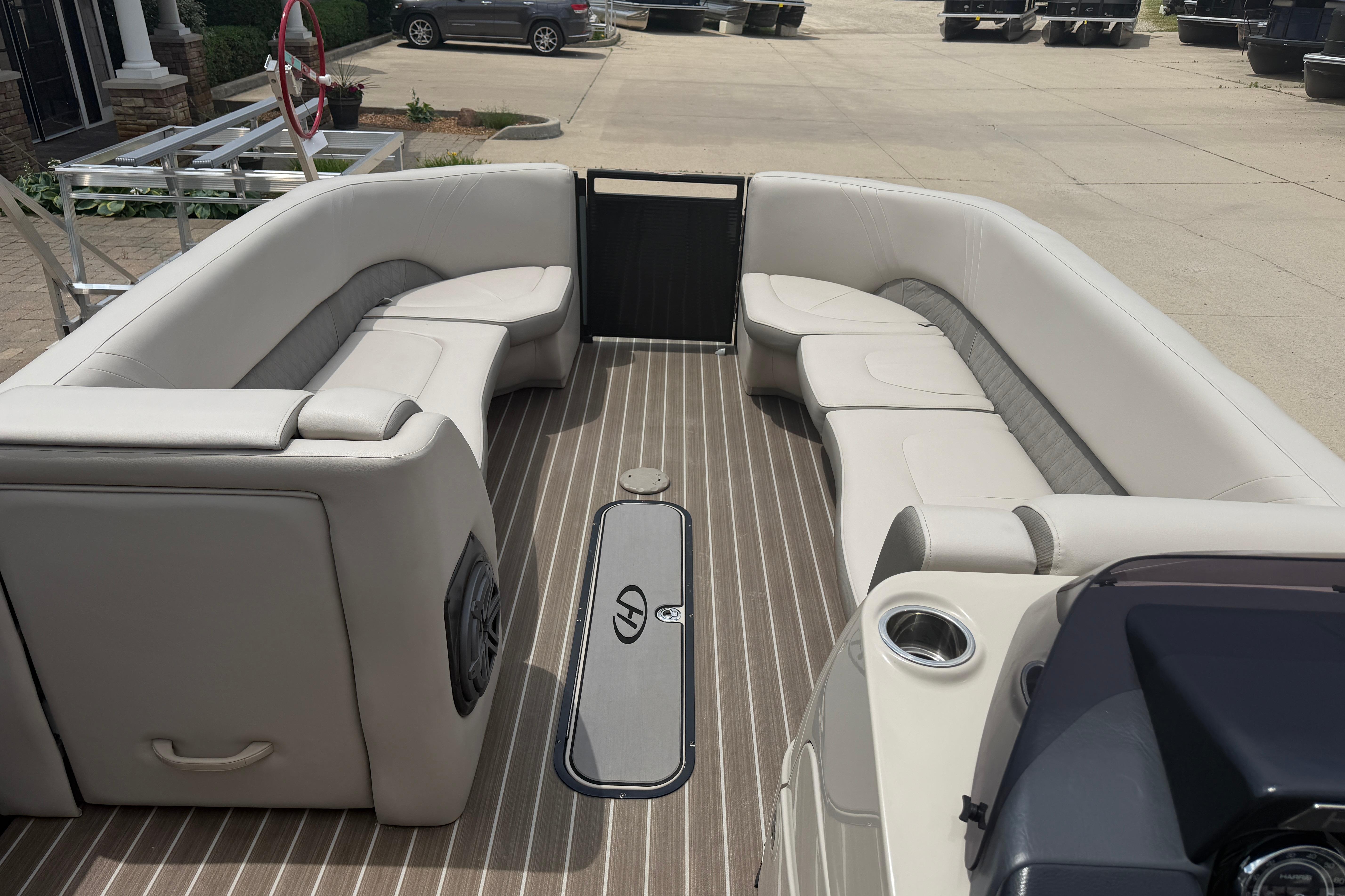 2019 Harris Solstice 240 pontoon boat interior with spacious seating and sleek design.