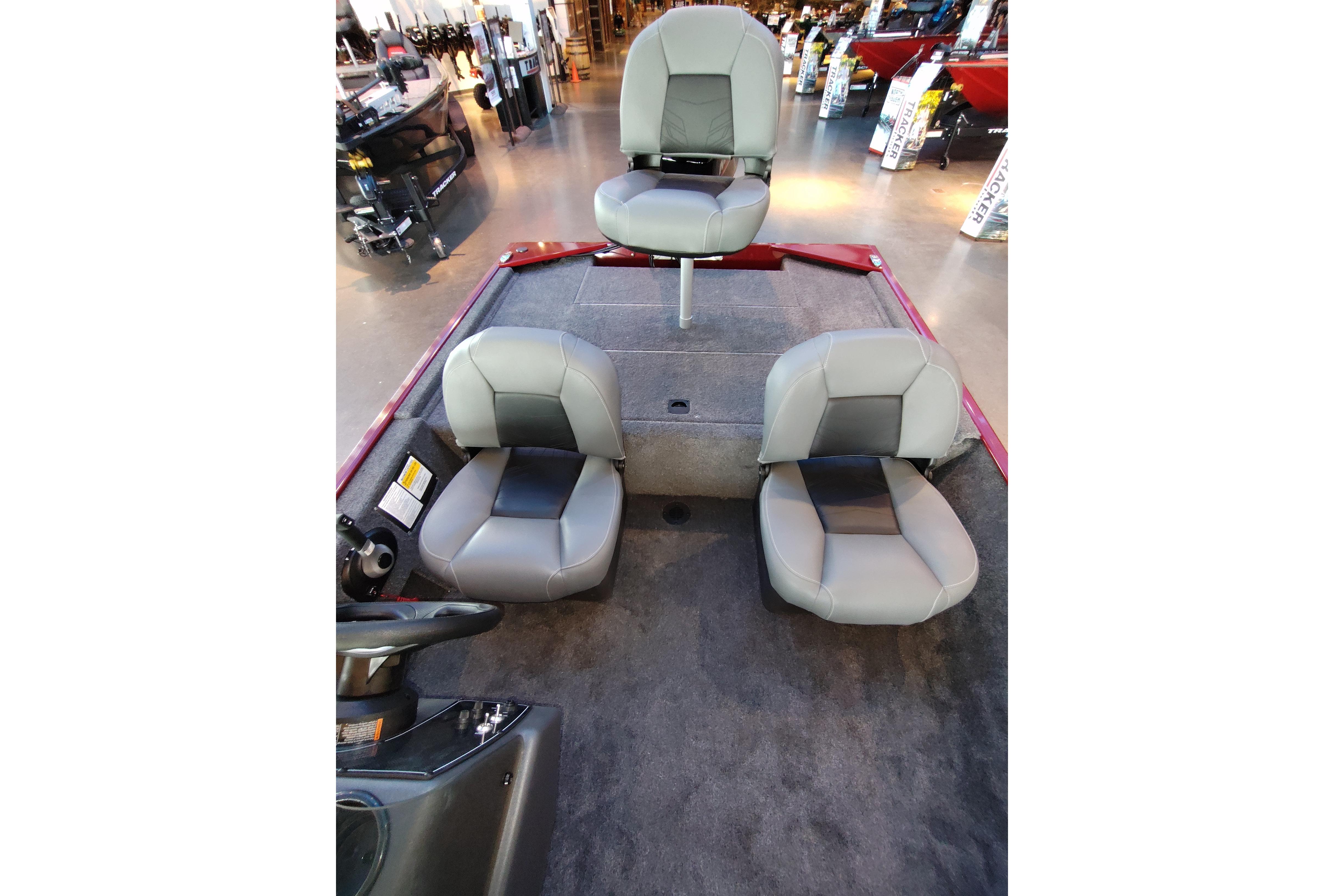 2026 Tracker Bass Tracker Classic XL boat interior with three gray seats.
