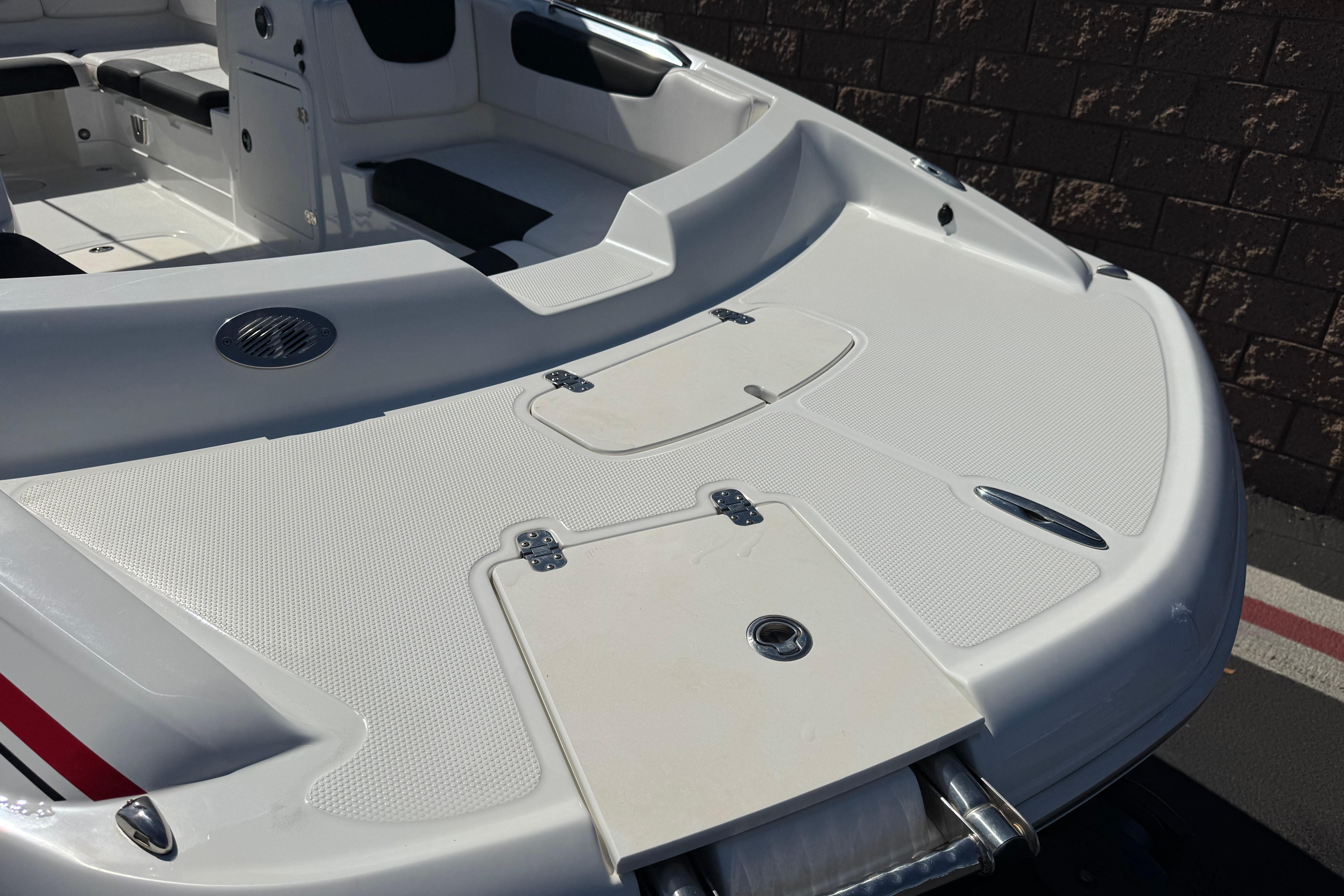 2019 Tahoe 2150 boat interior with seating and storage compartments.