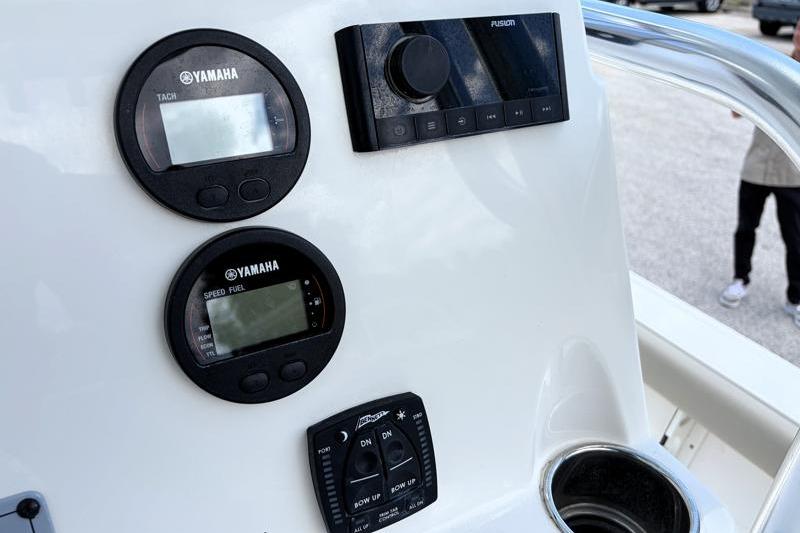 Dashboard of 2025 Key West 210 Bay Reef boat with Yamaha gauges and Fusion audio controls.