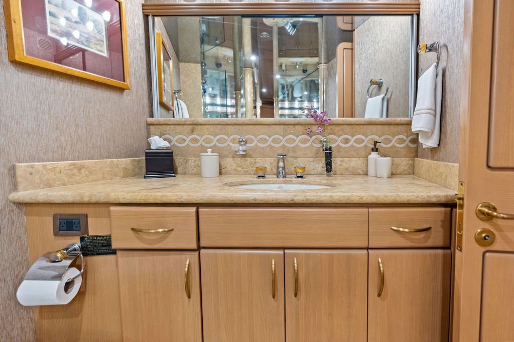 Luxurious bathroom in a 1999 Westport 112 yacht model.