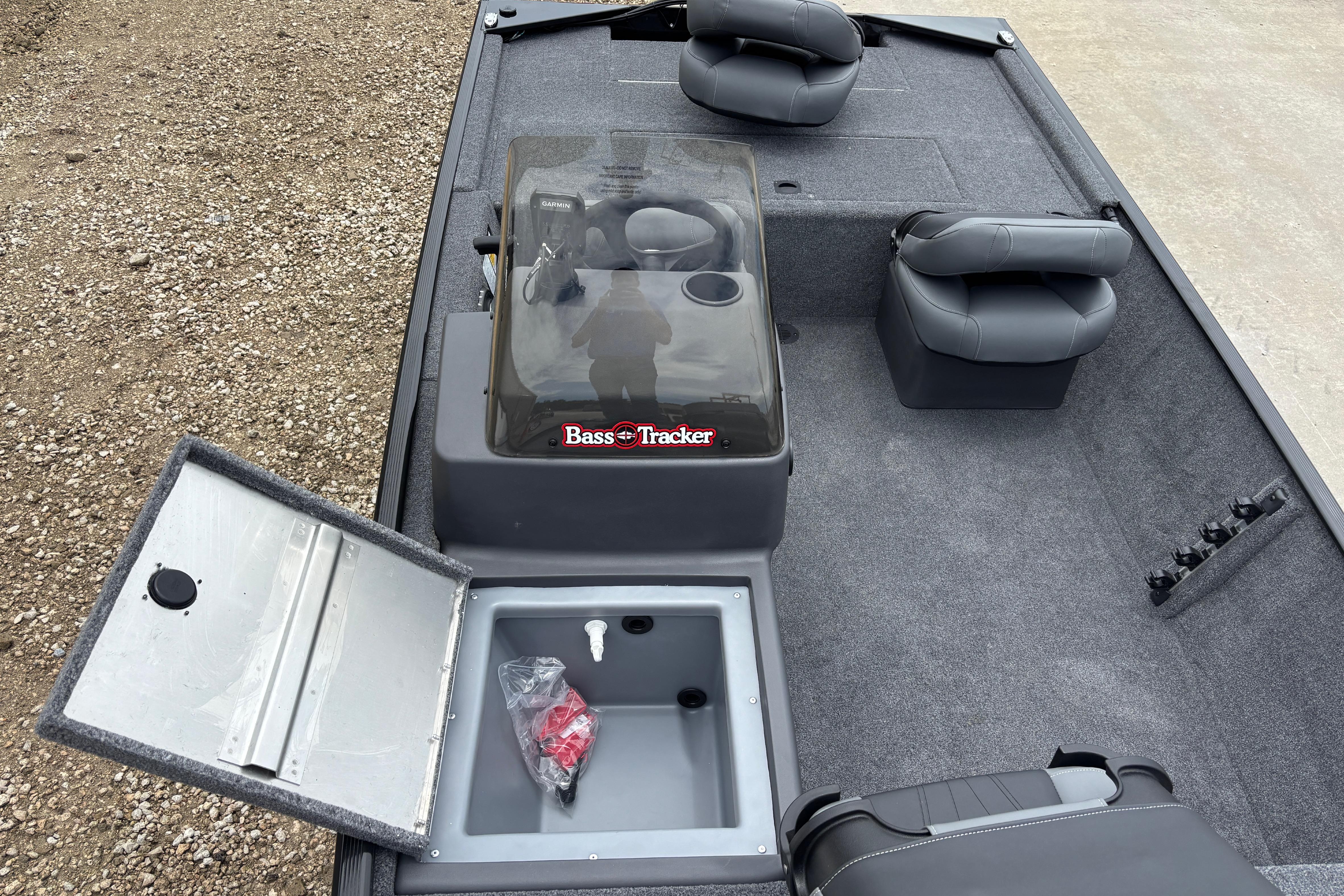 2026 Tracker Bass Tracker Classic XL boat interior with storage compartment open.