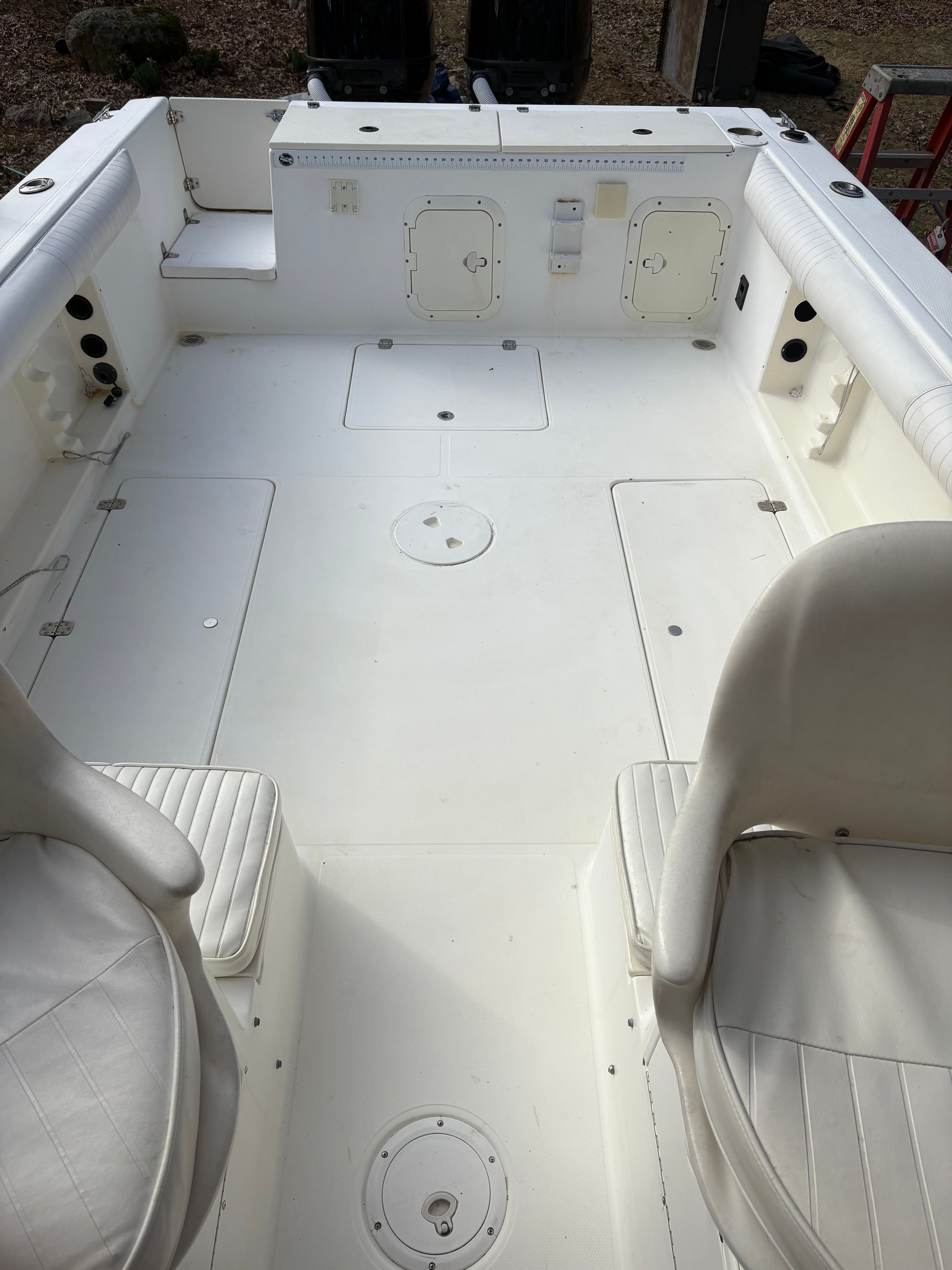 Interior of a 2000 Spacecraft Cuddy with white seating.