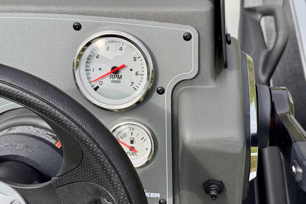 Dashboard of 2026 Sun Tracker Bass Buggy 18 DLX with RPM and fuel gauges.