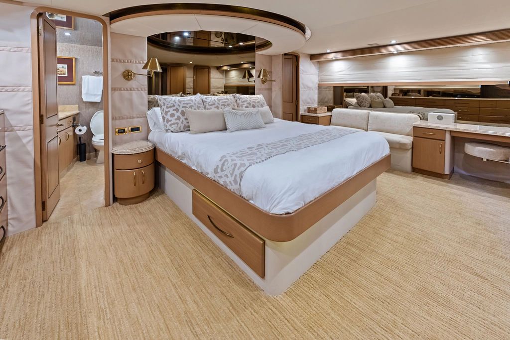 Luxurious bedroom in a 1999 Westport 112 yacht model.