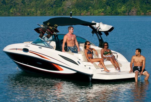 Manufacturer Provided Image: 2013 Sea Ray 260 Sundeck with people enjoying on a lake.