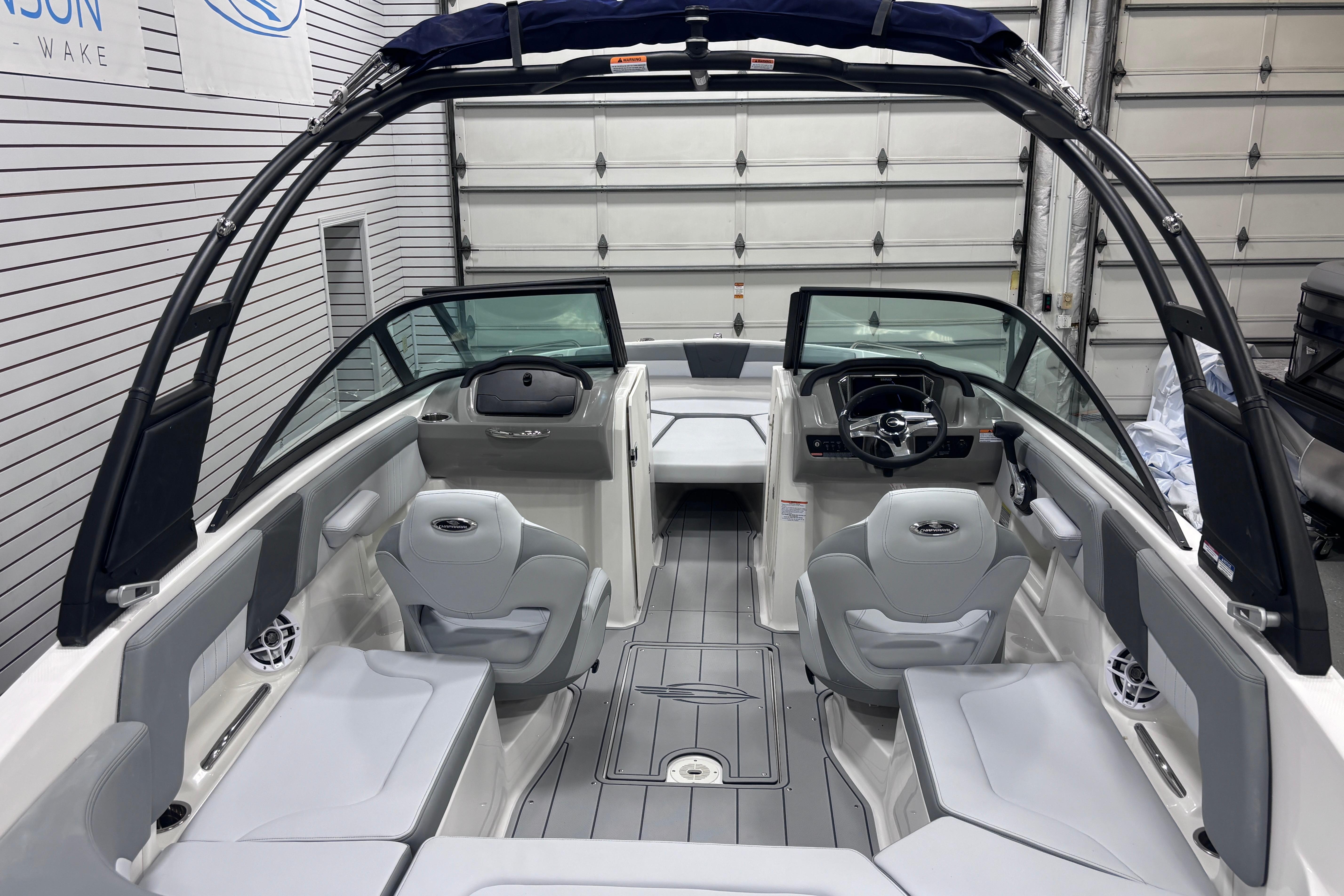 2026 Chaparral 23 SSi boat interior with sleek seating and modern dashboard.