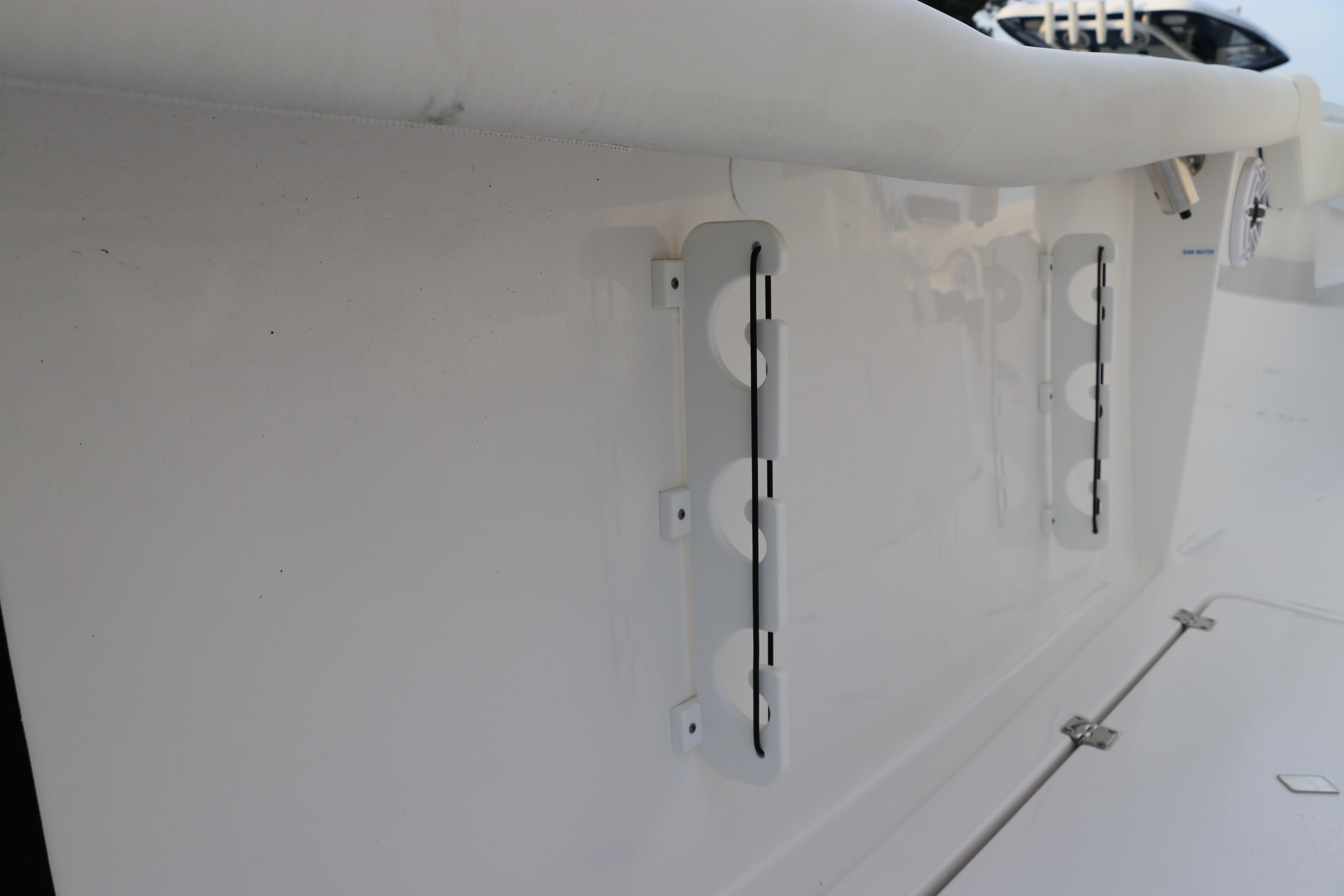 2024 Tidewater 256 LXF boat detail, featuring sleek white exterior and hardware.