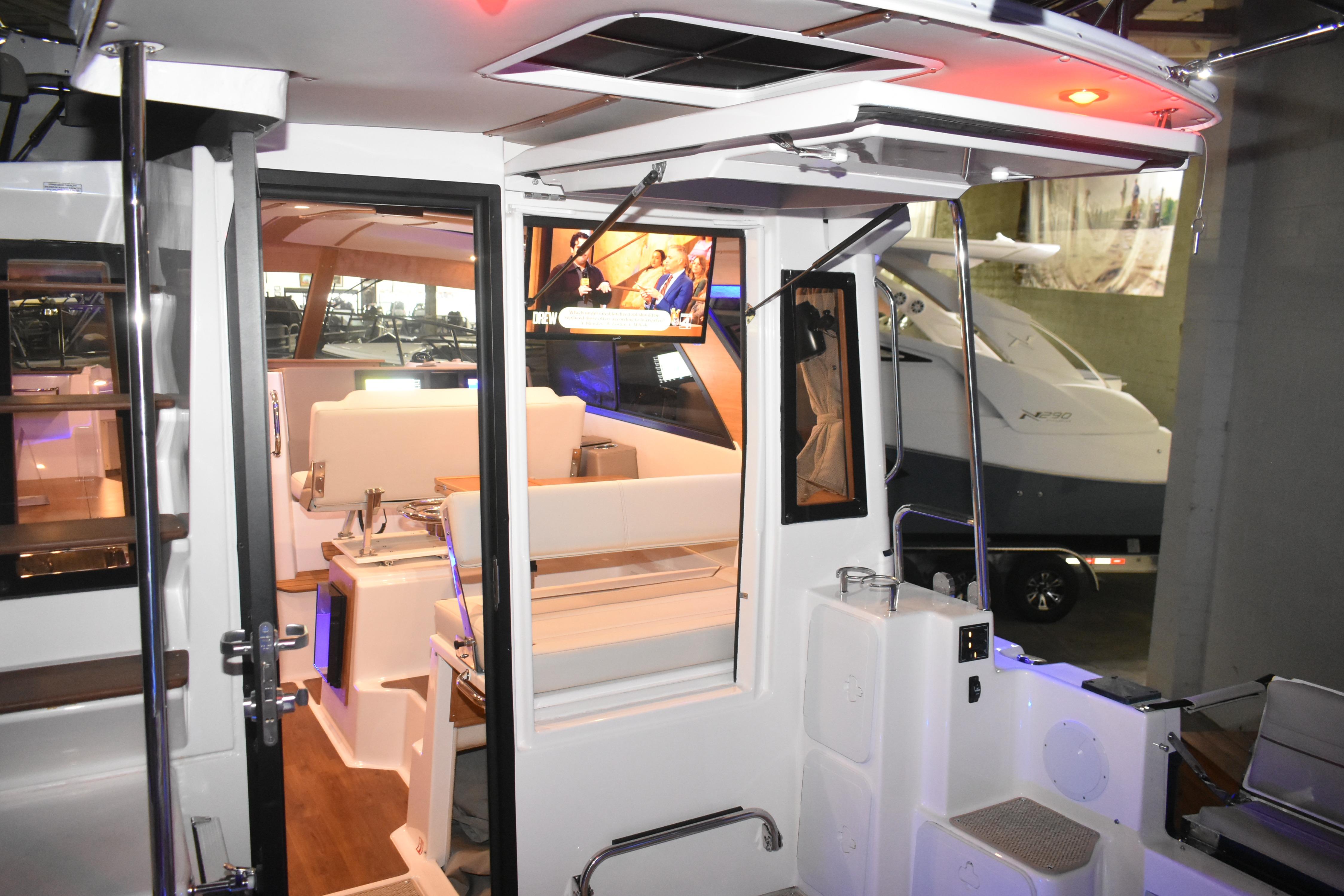 Interior view of 2026 Cutwater C-32 CB boat showcasing seating and modern amenities.