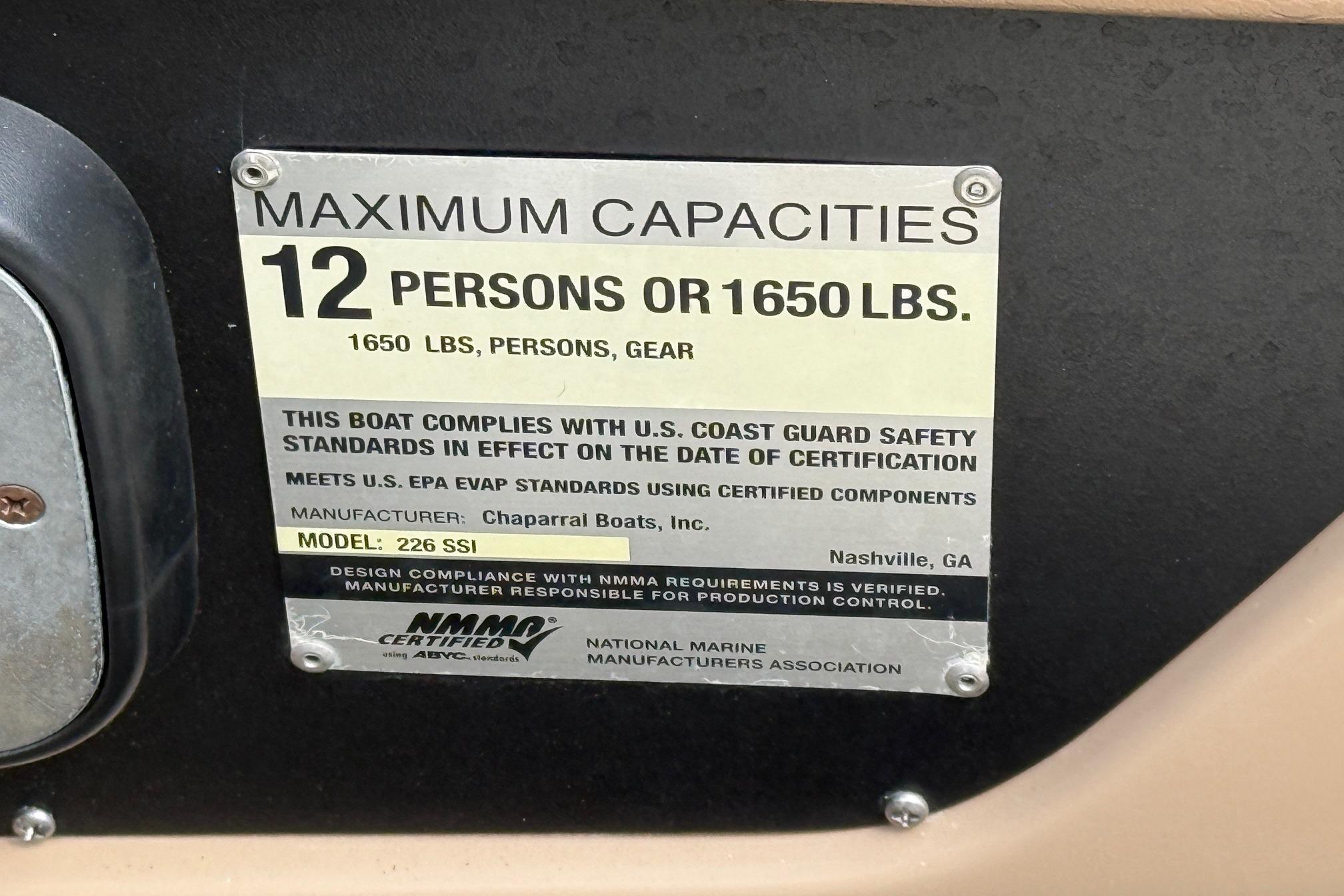 Capacity label for 2016 Chaparral 226 SSi Wide Tech, 12 persons or 1650 lbs.