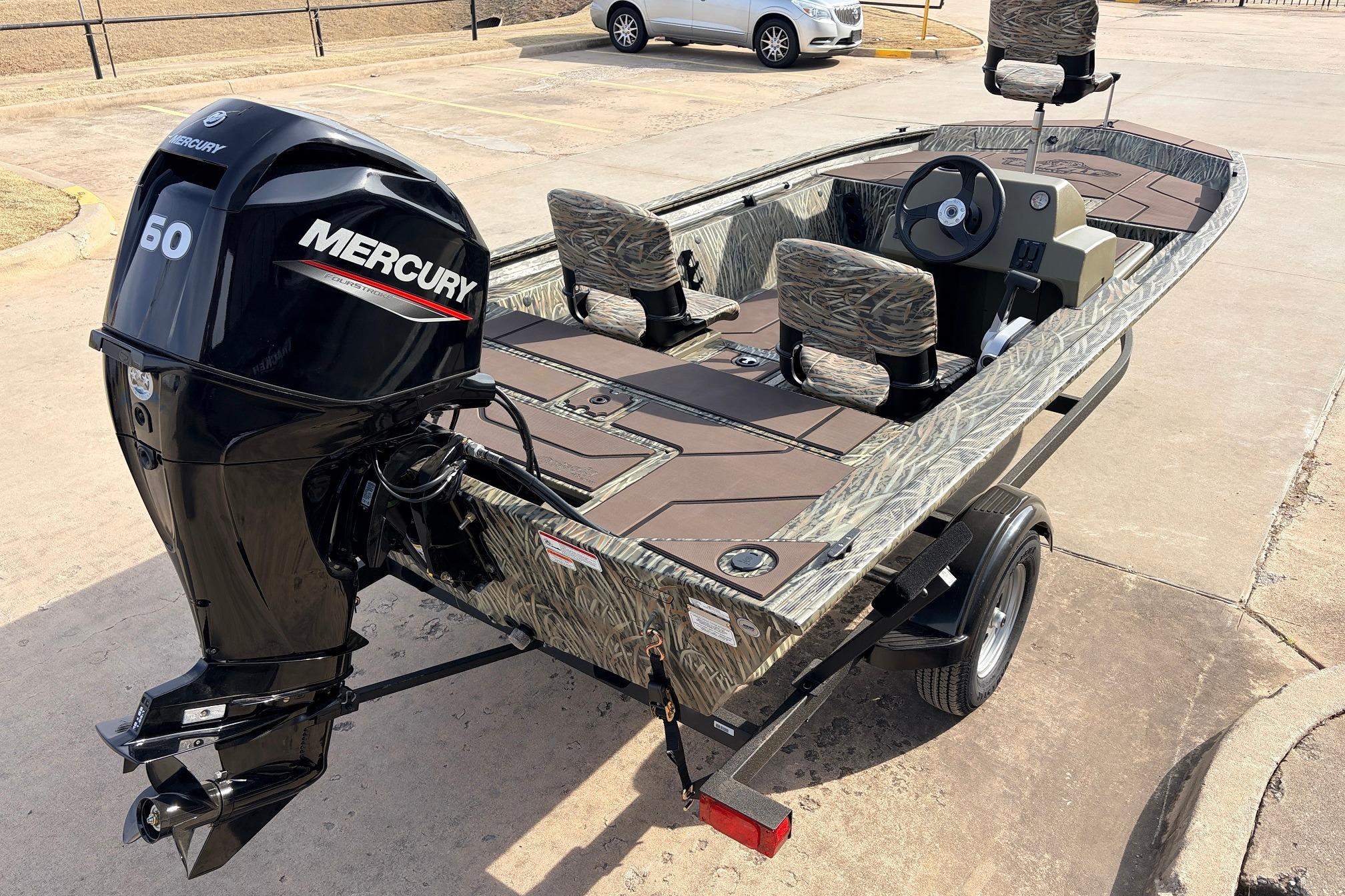 2026 Tracker Grizzly 1754 SC boat with Mercury 60 engine, parked on a trailer.