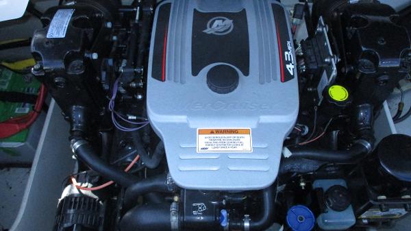 Engine of a 2012 Crownline 21 SS boat, featuring a 4.3L MerCruiser.