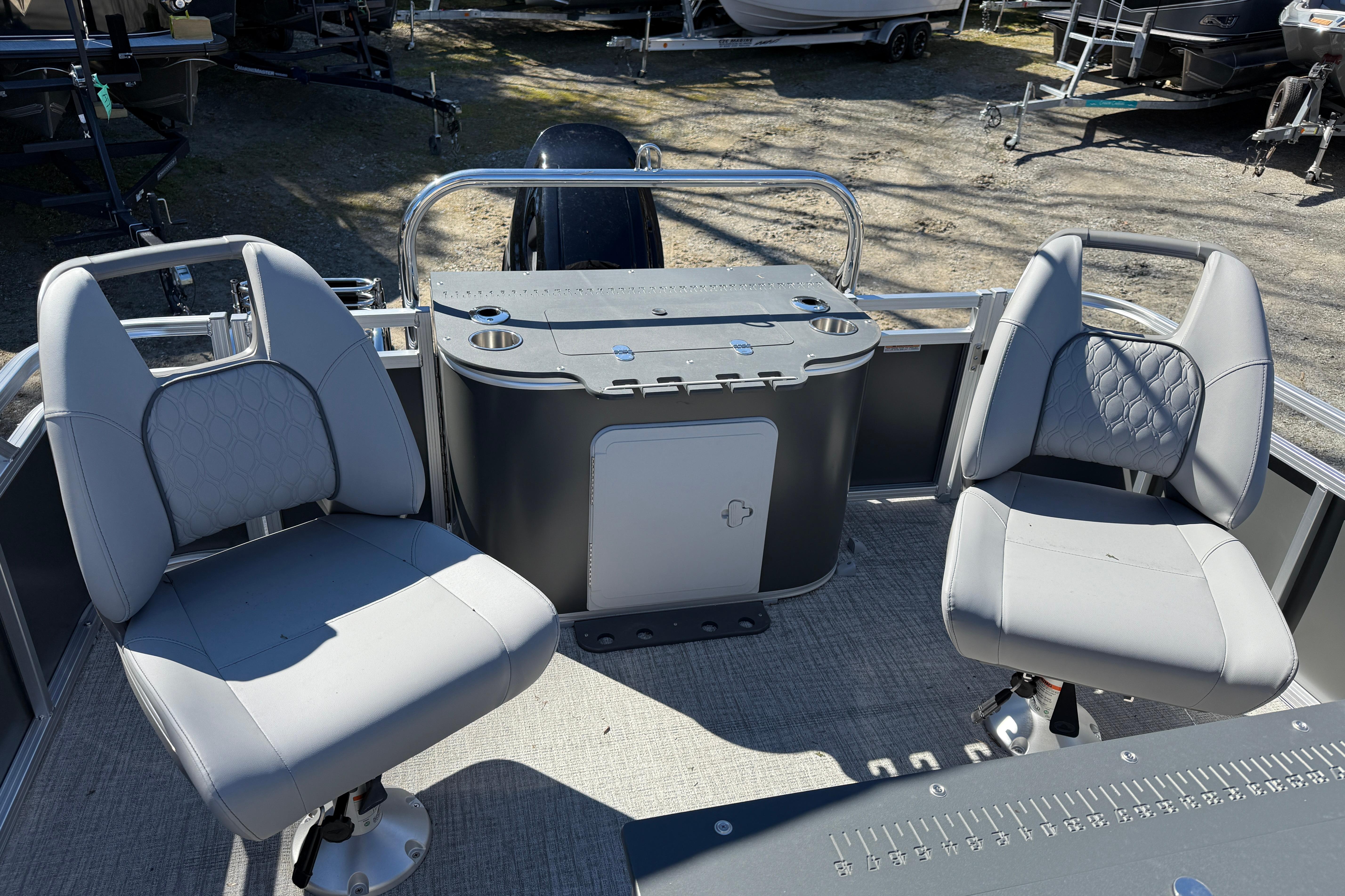 2026 Tahoe Pontoon Sport 85 Rear Fish with dual gray seats and fishing station.